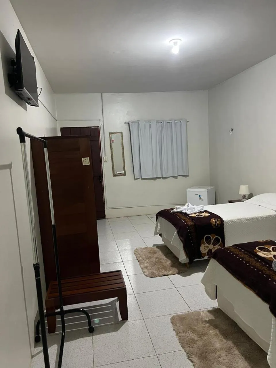 Bed in POUSADA ESTRELA DA MANHÃ