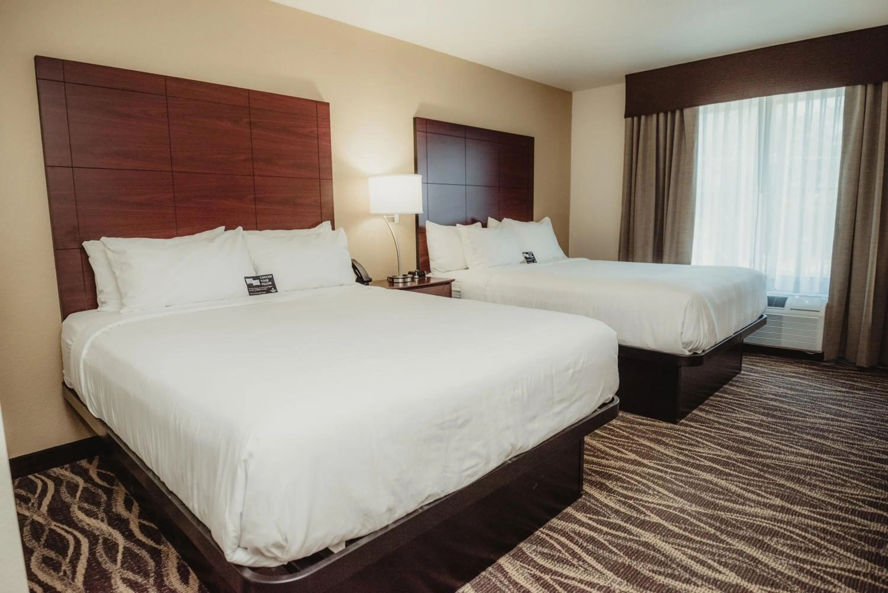 Bedroom, Bed in Cobblestone Hotel & Suites - Ottumwa
