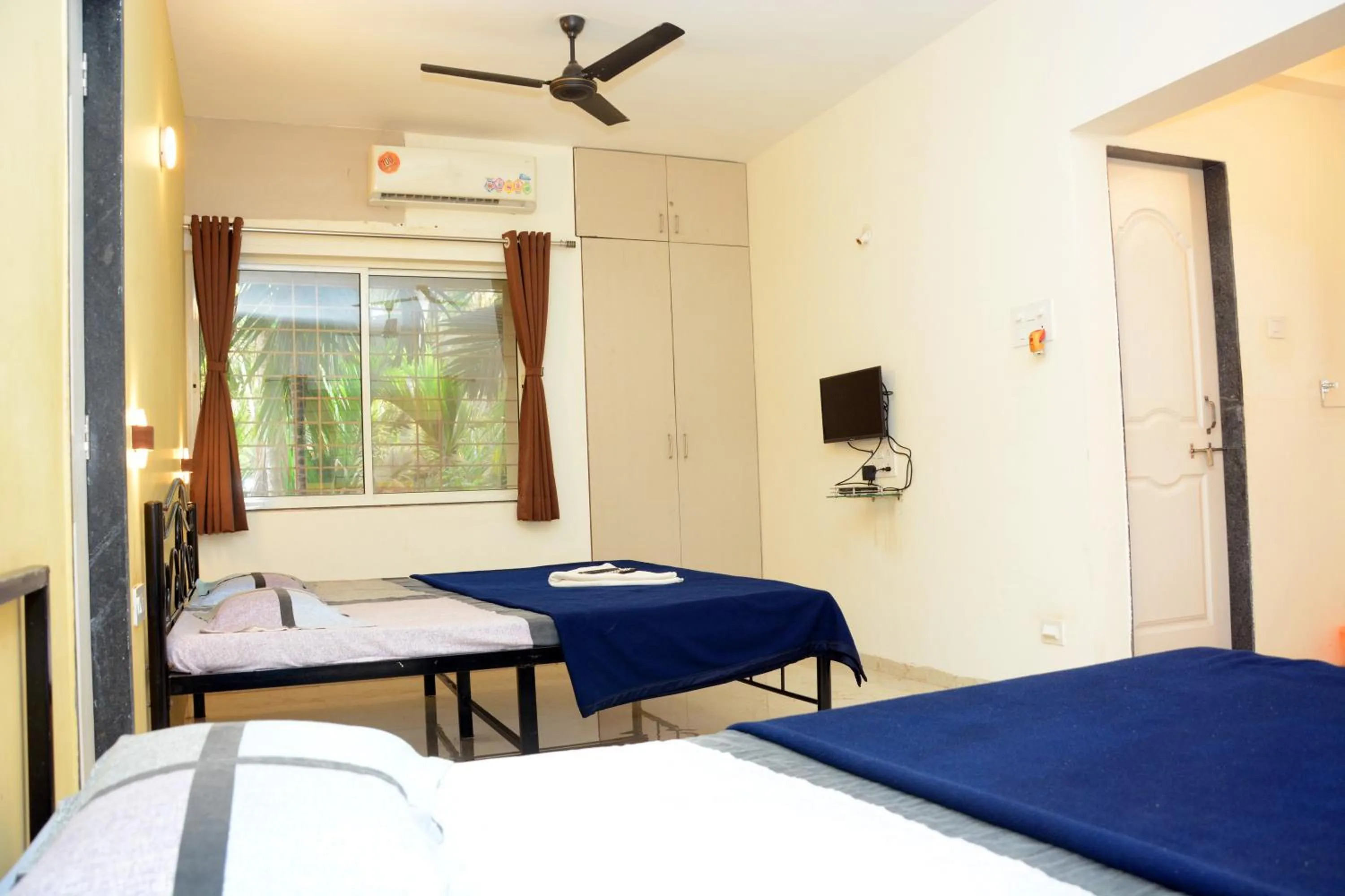 air conditioner, Bed in Shree Swami Samarth Resort
