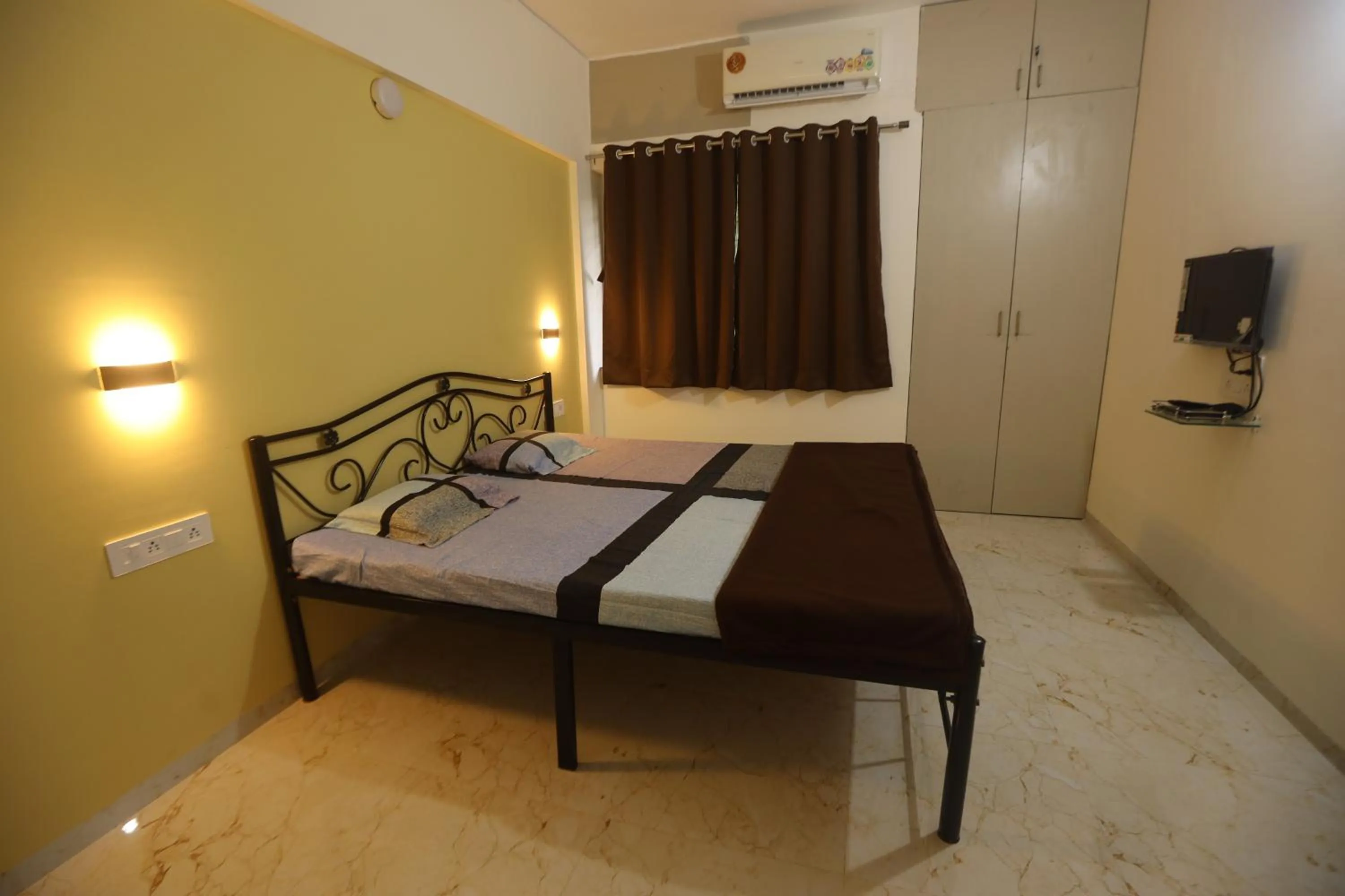 Bed in Shree Swami Samarth Resort