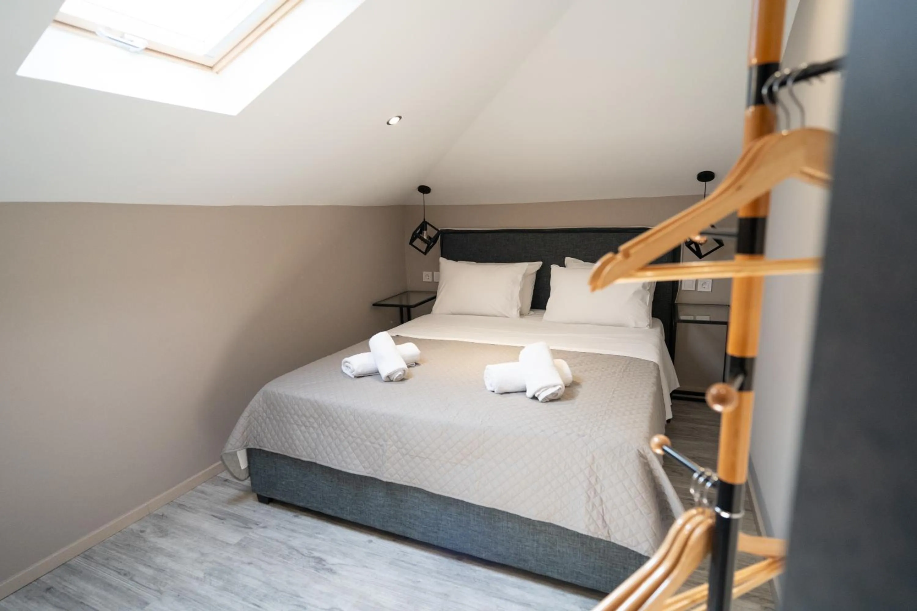 Bed in Parthenis Riviera Hotel