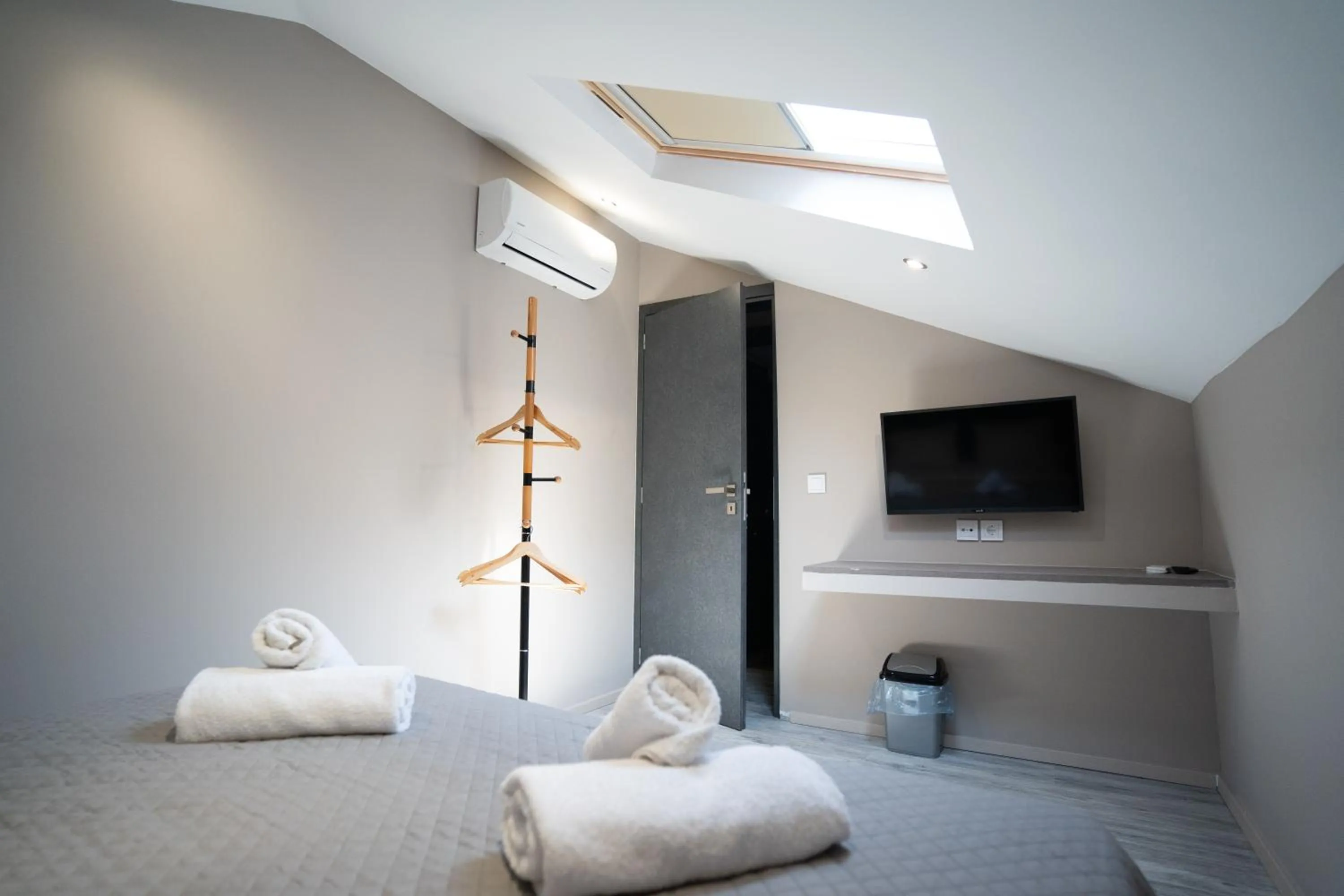 Bed in Parthenis Riviera Hotel