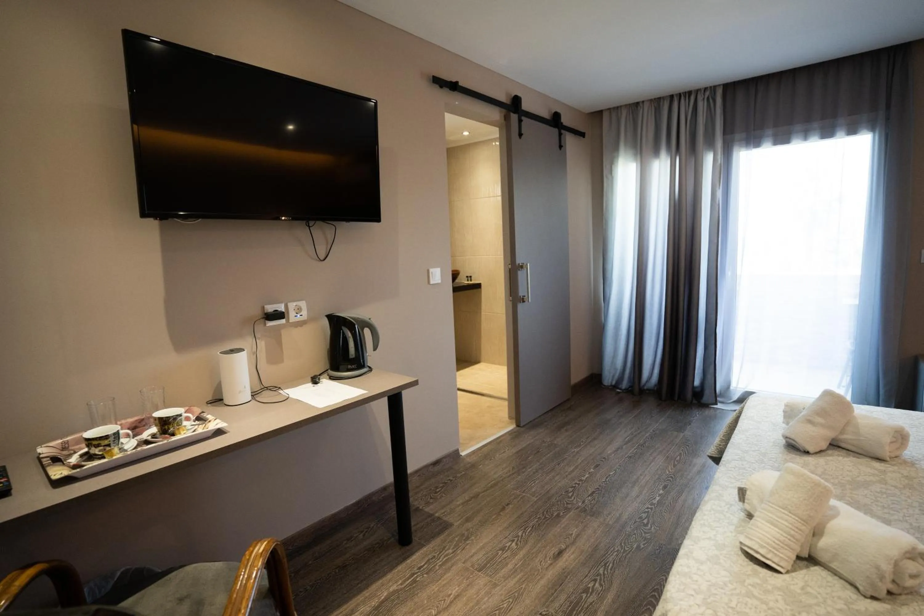 Bed in Parthenis Riviera Hotel