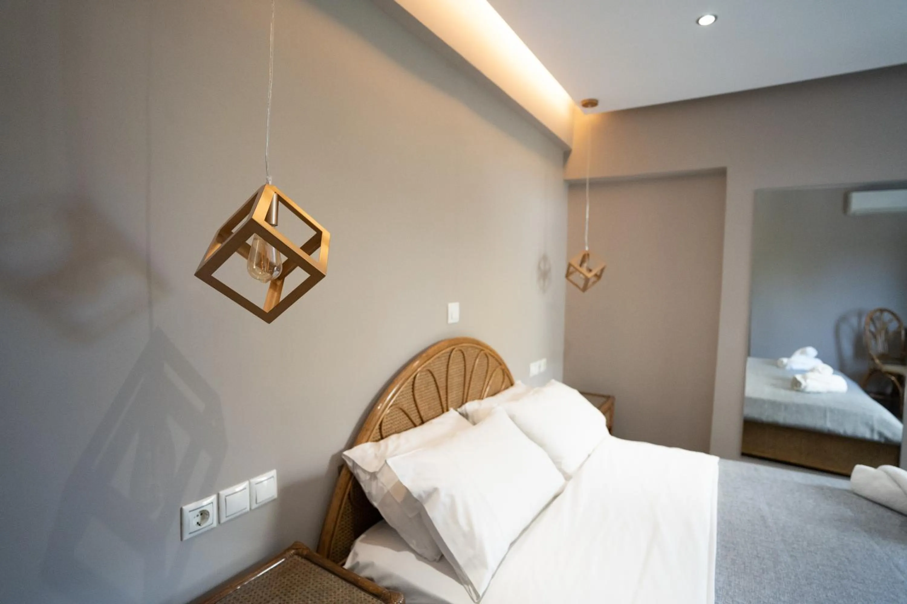 Bed in Parthenis Riviera Hotel