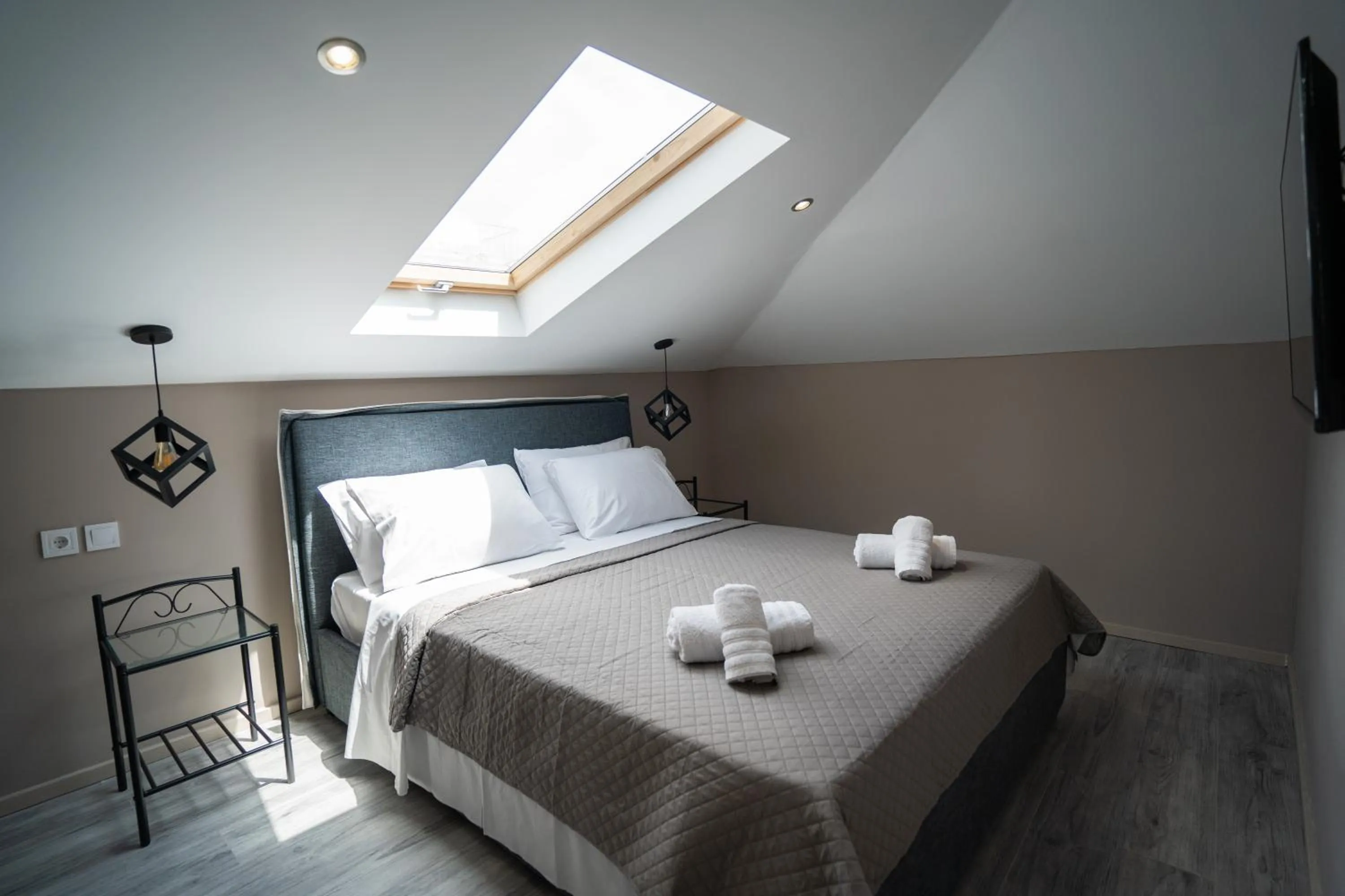 Bed in Parthenis Riviera Hotel