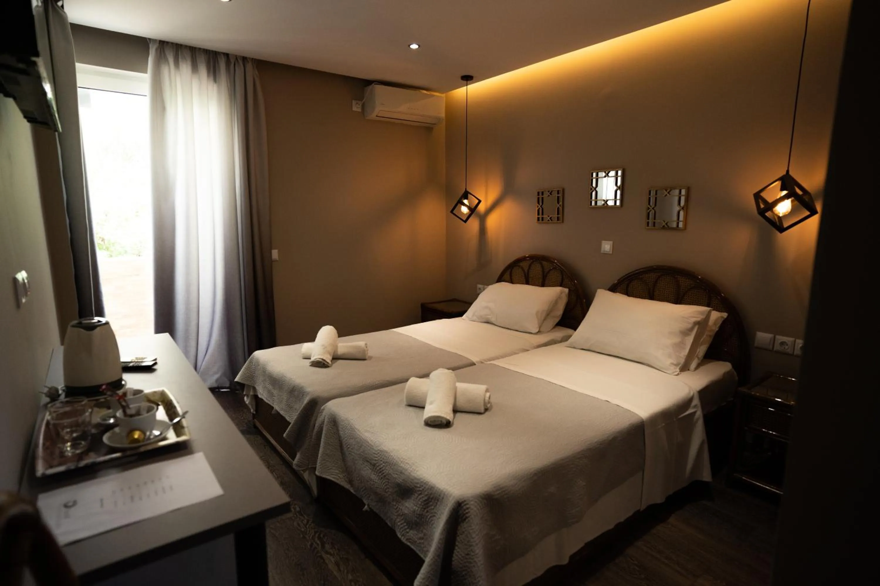 Bed in Parthenis Riviera Hotel