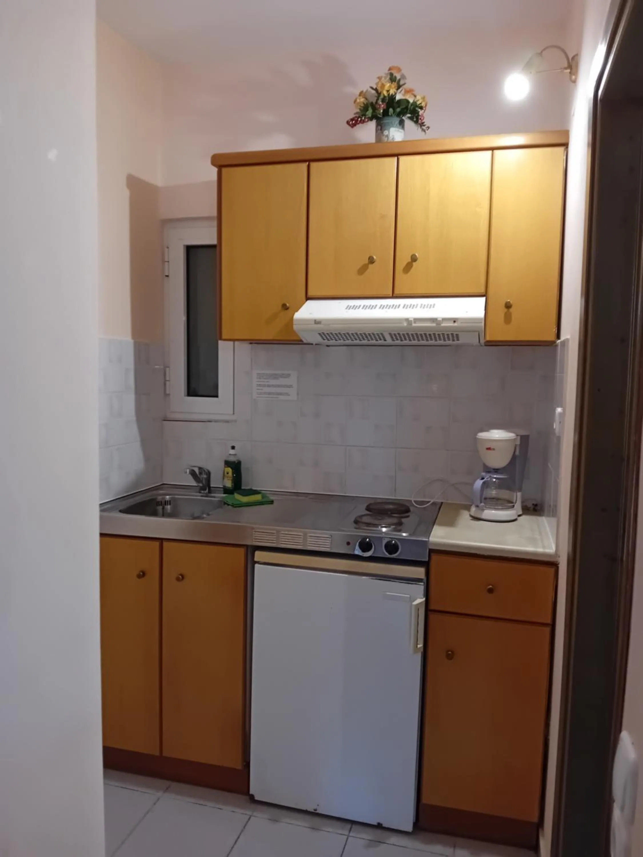 Kitchen or kitchenette in Heliotopos Apartments