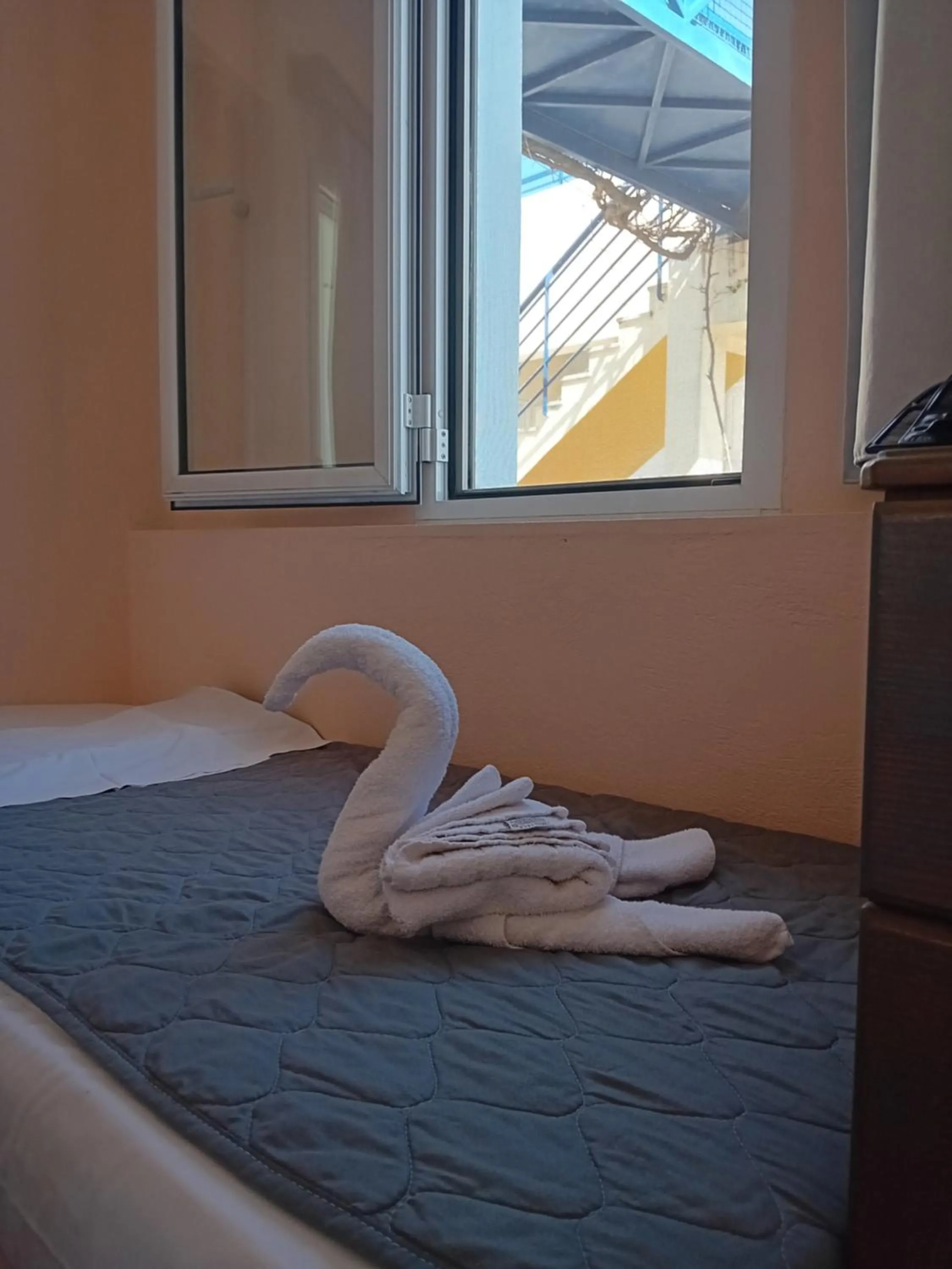 Bed in Heliotopos Apartments