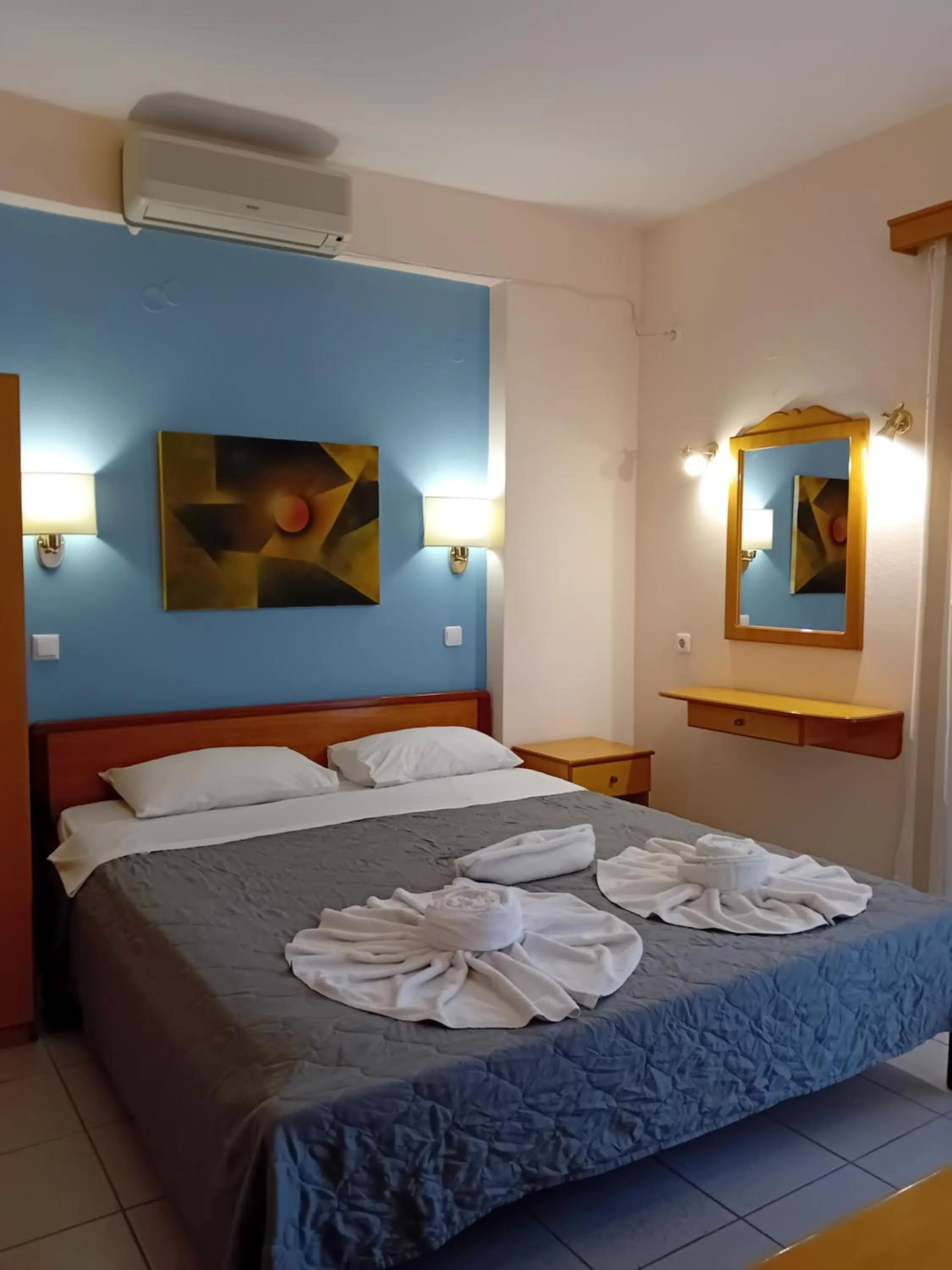 Bed in Heliotopos Apartments