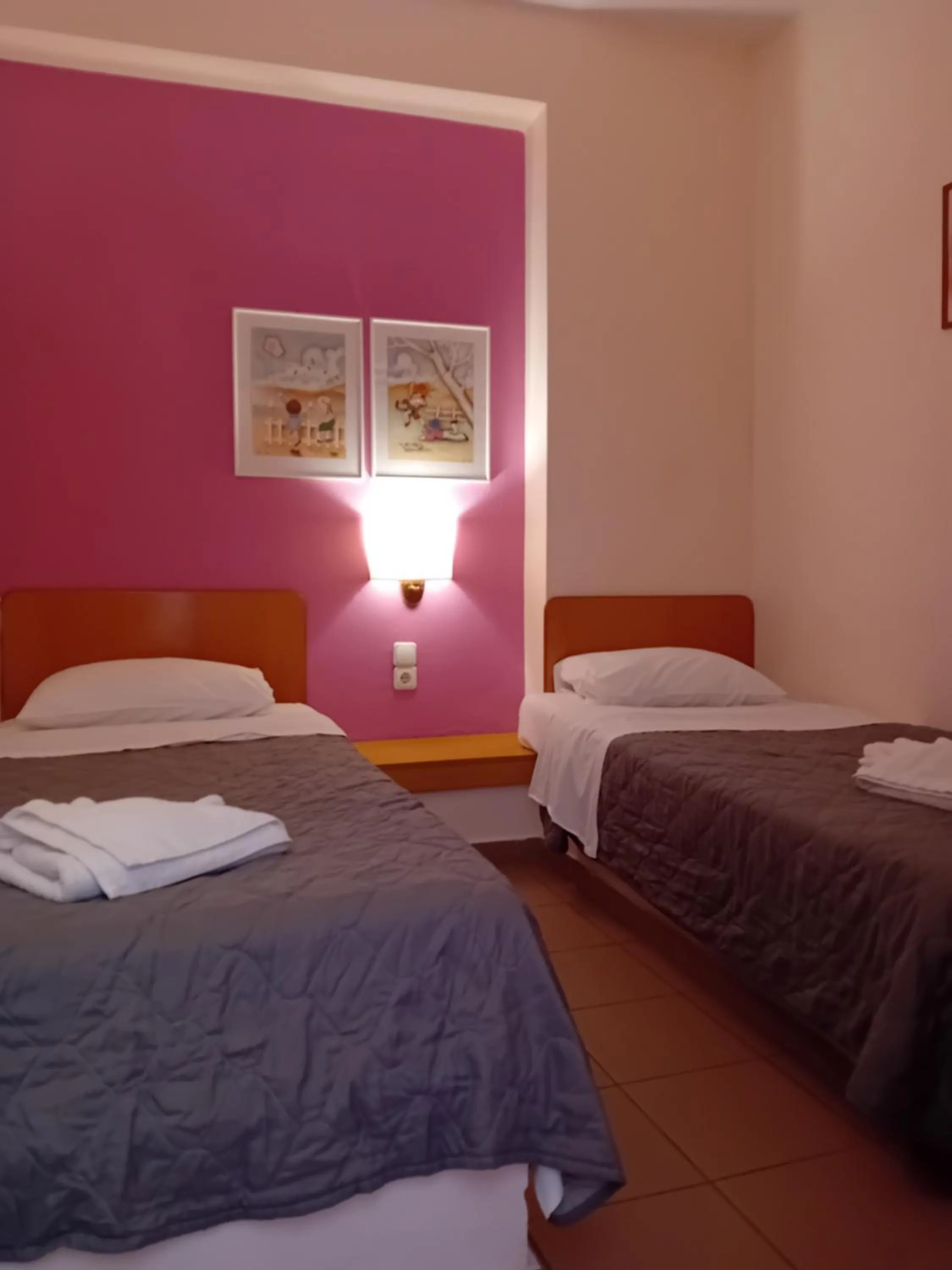 Bed in Heliotopos Apartments