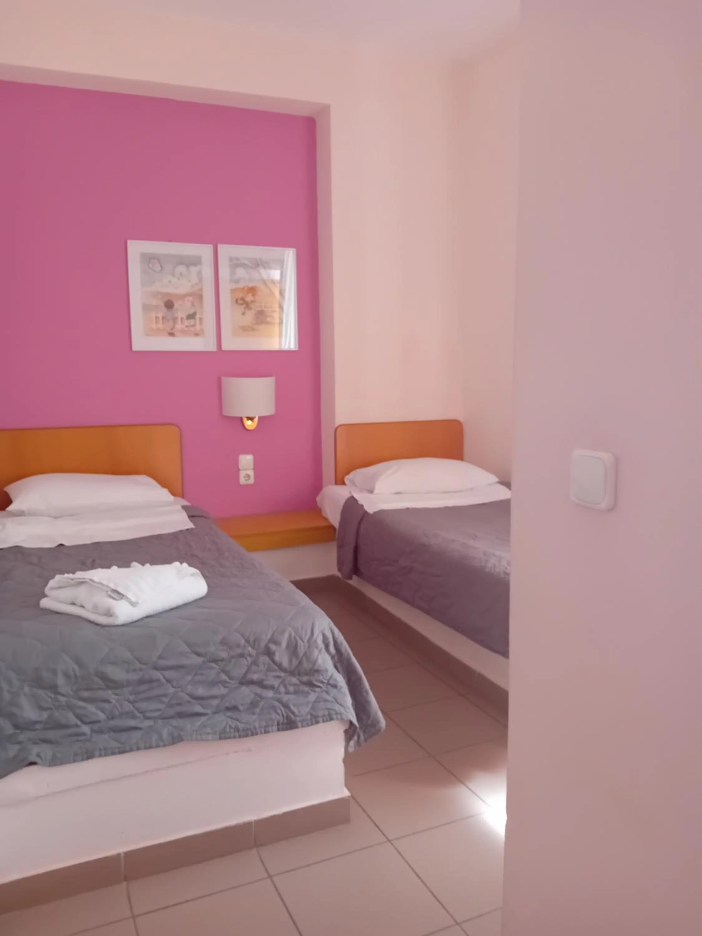 Bed in Heliotopos Apartments