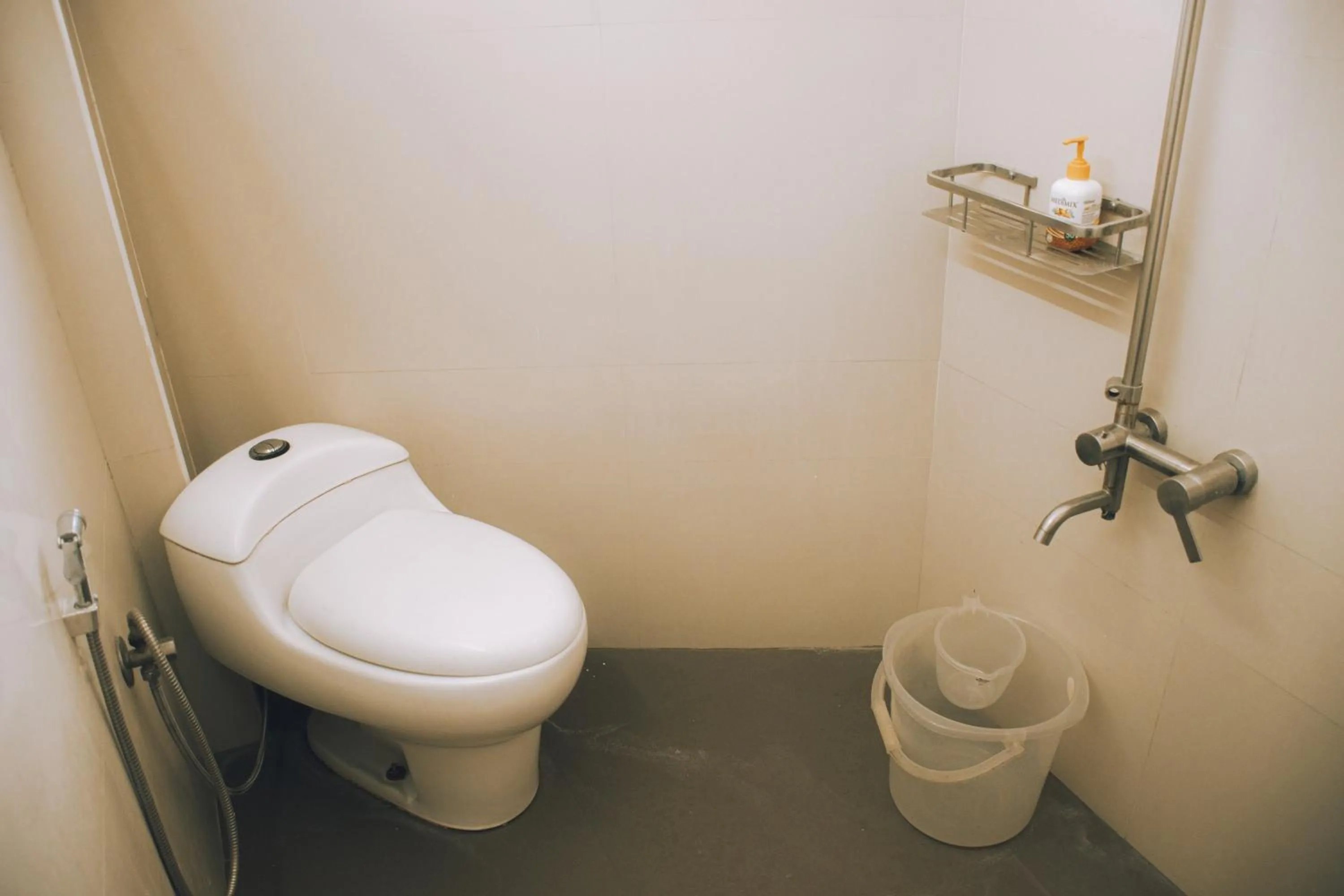 Toilet in Naksha Tree Hotels Kishore Inn - Koyambedu