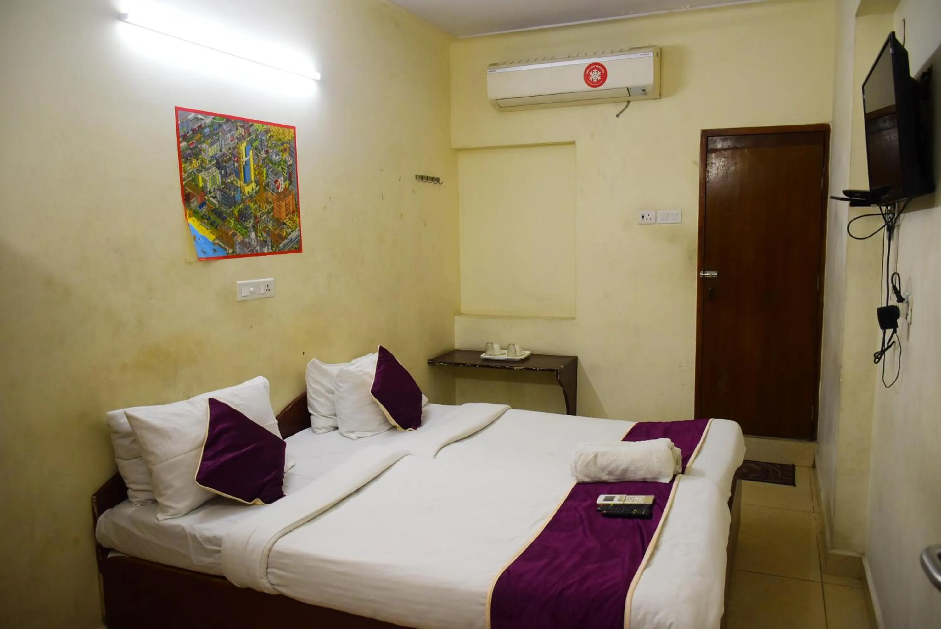 Bed in Naksha Tree Hotels Kishore Inn - Koyambedu