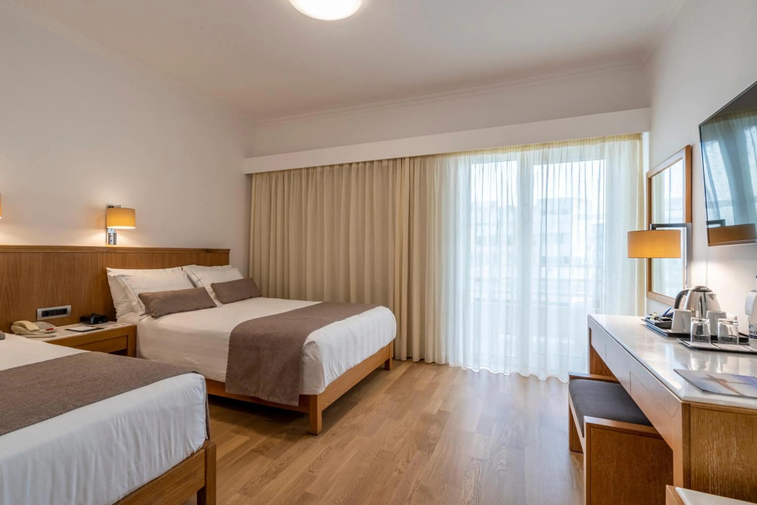 Photo of the whole room, Bed in Kydon The Heart City Hotel