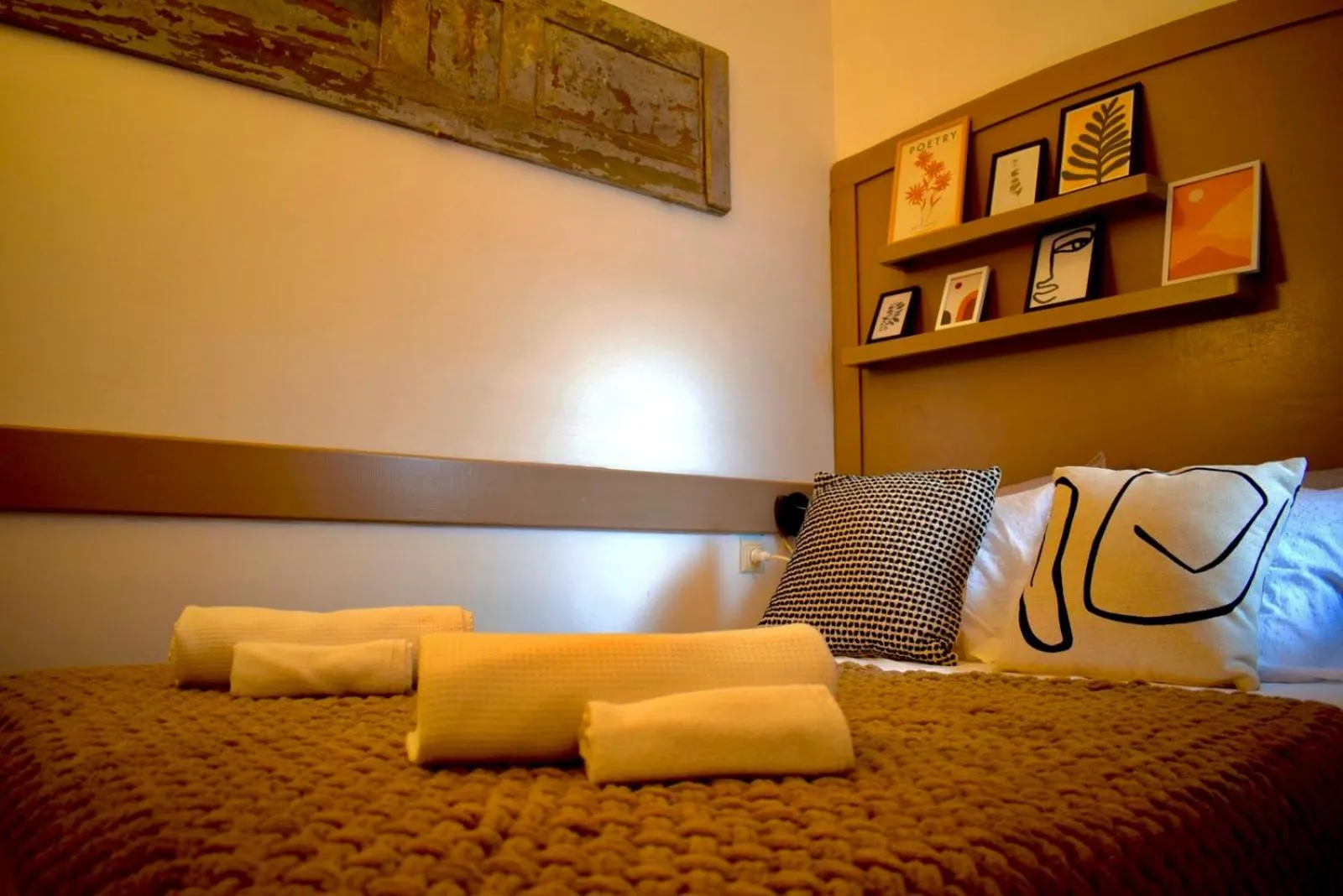 Bed in Carmen Art Hotel