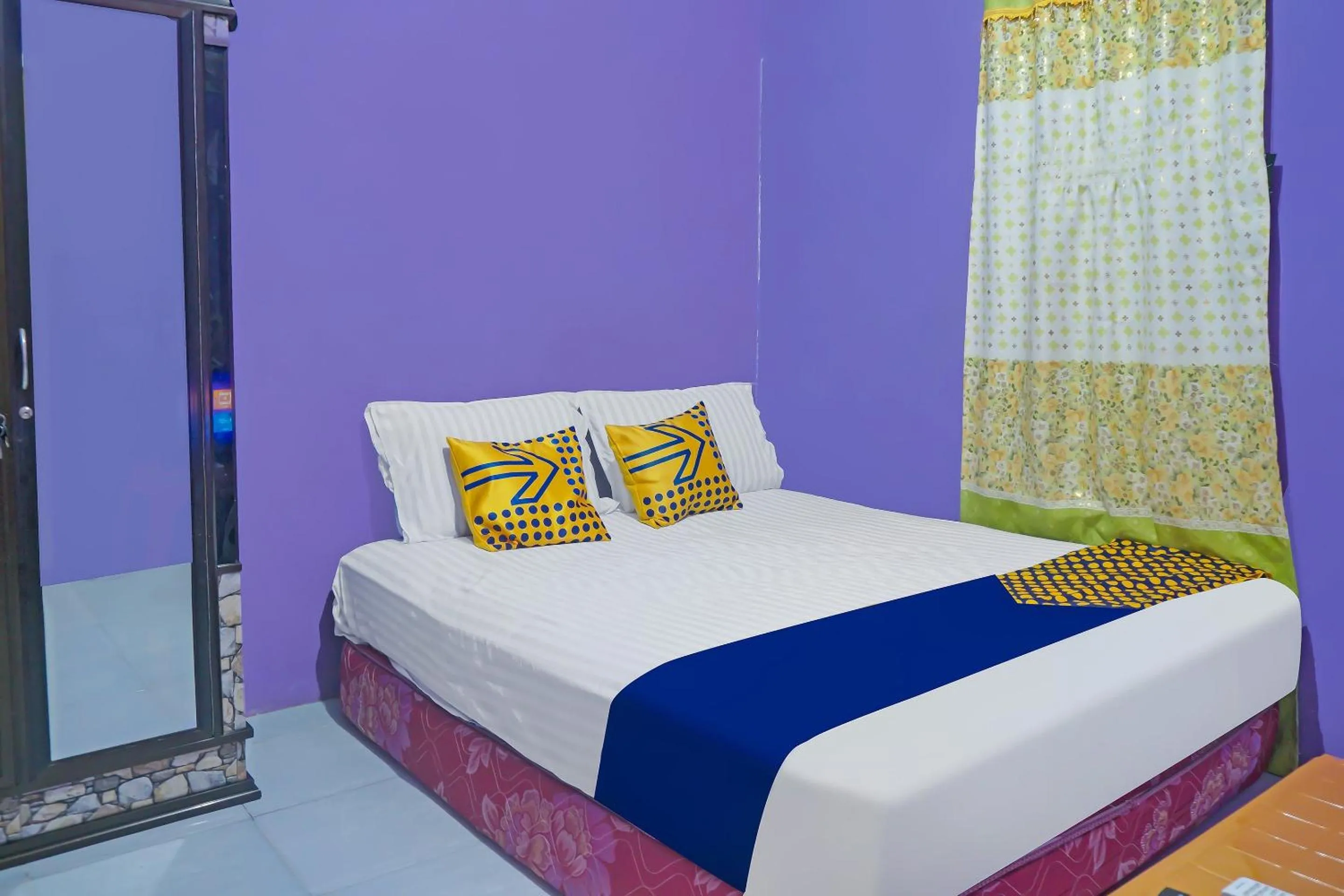 Bedroom in Hotel O Kost Qiu Qiu 99