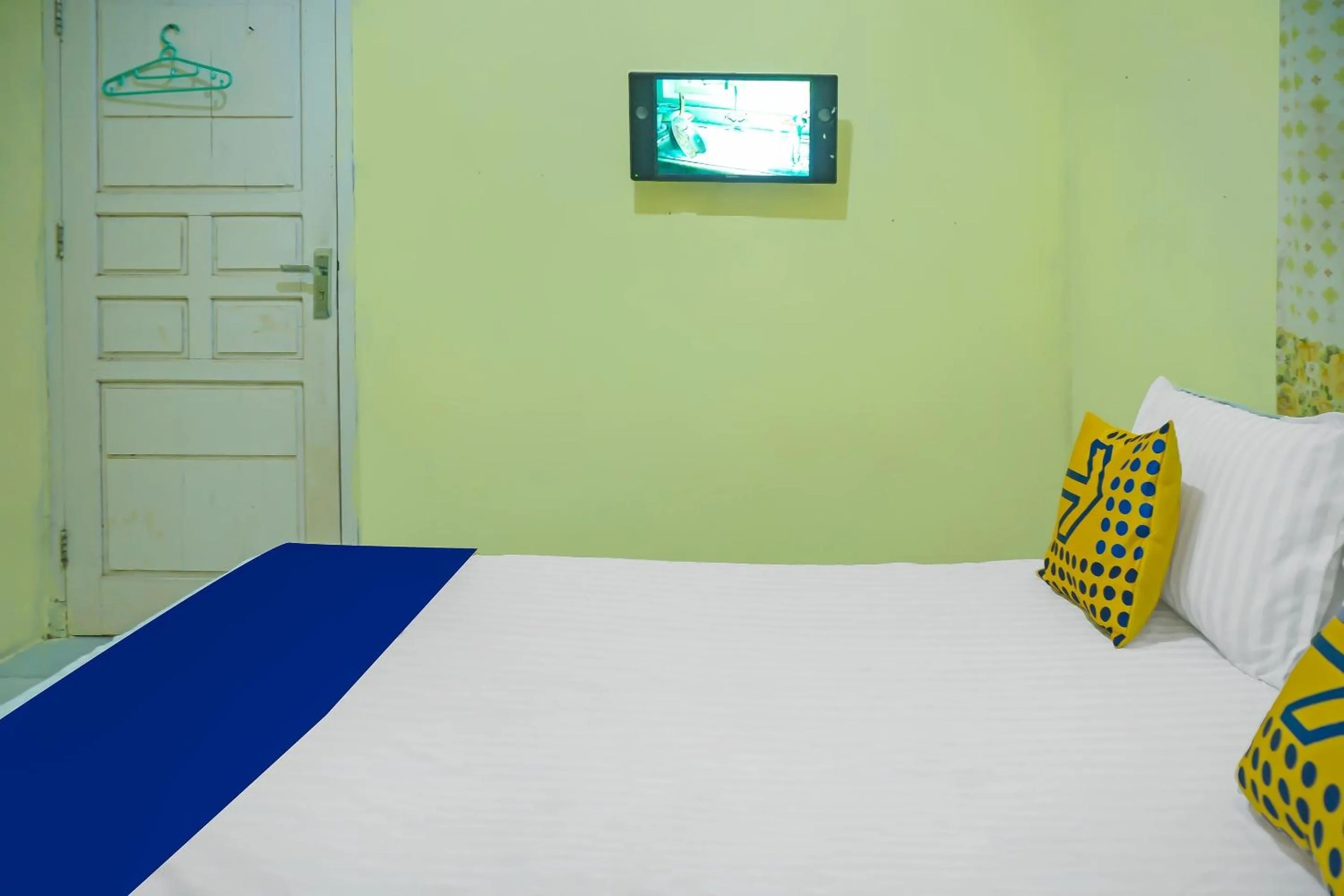 Bedroom in Hotel O Kost Qiu Qiu 99