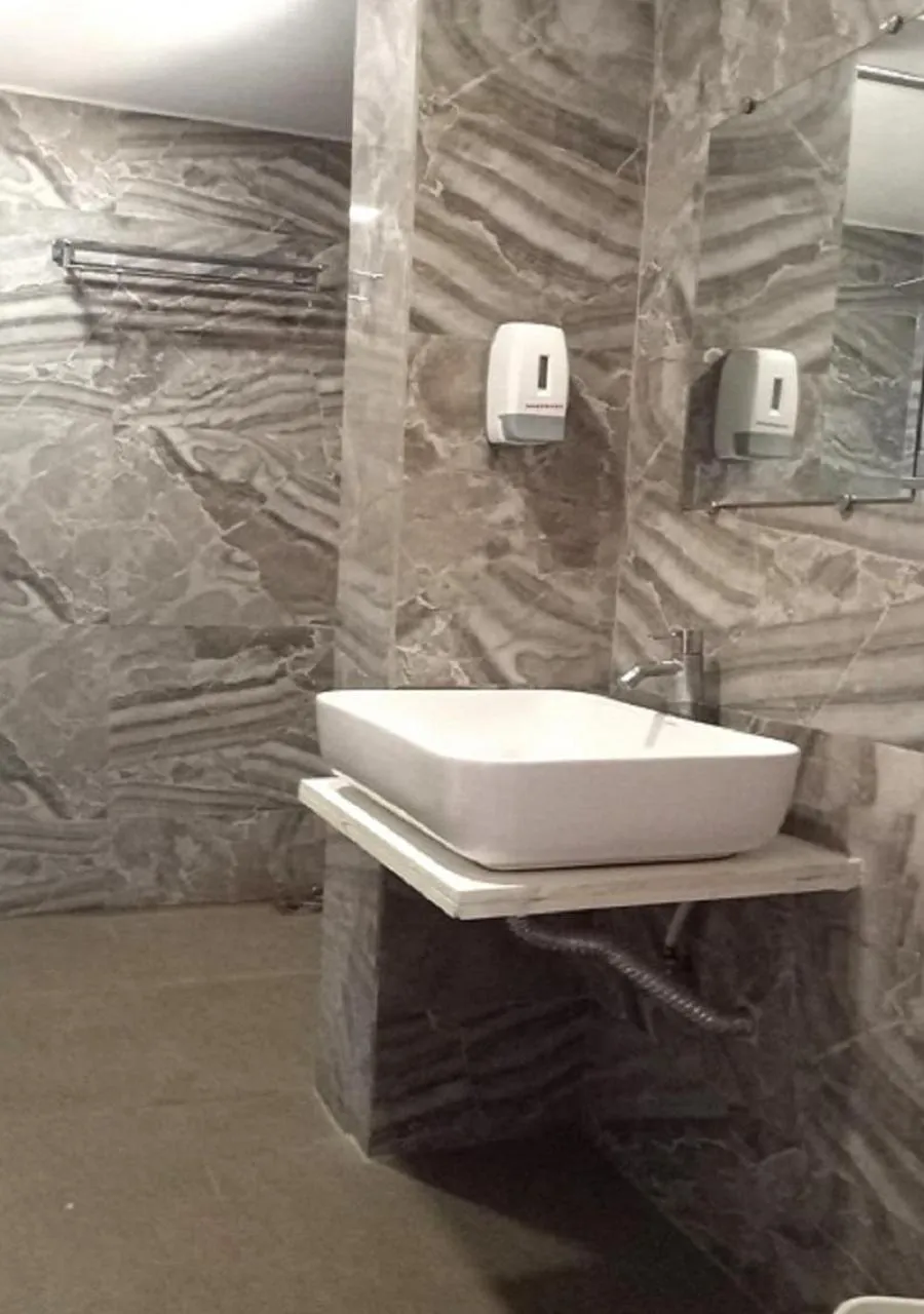 Bathroom in The Grand Takshak Hotel