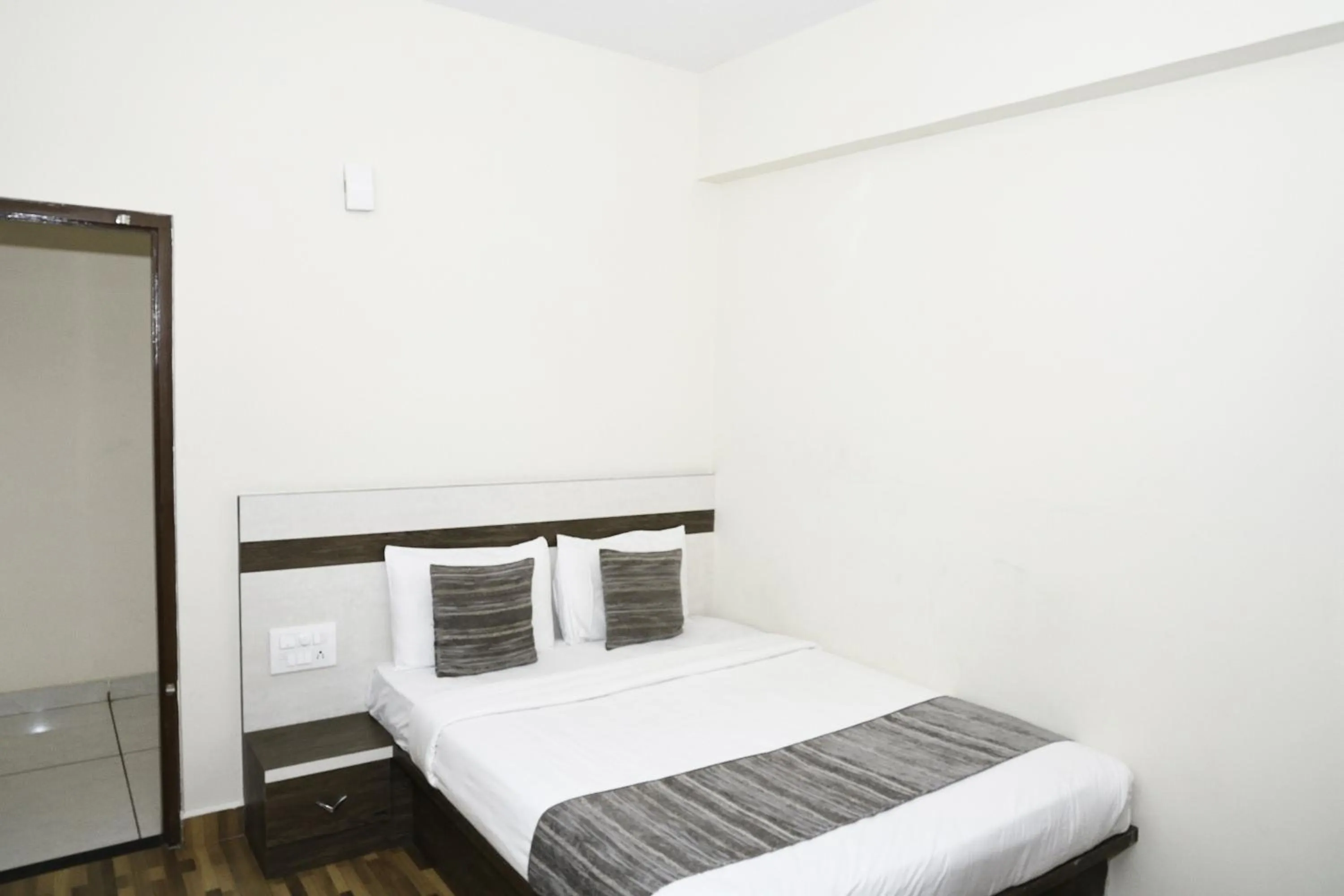 Bed in Hotel JP Grand