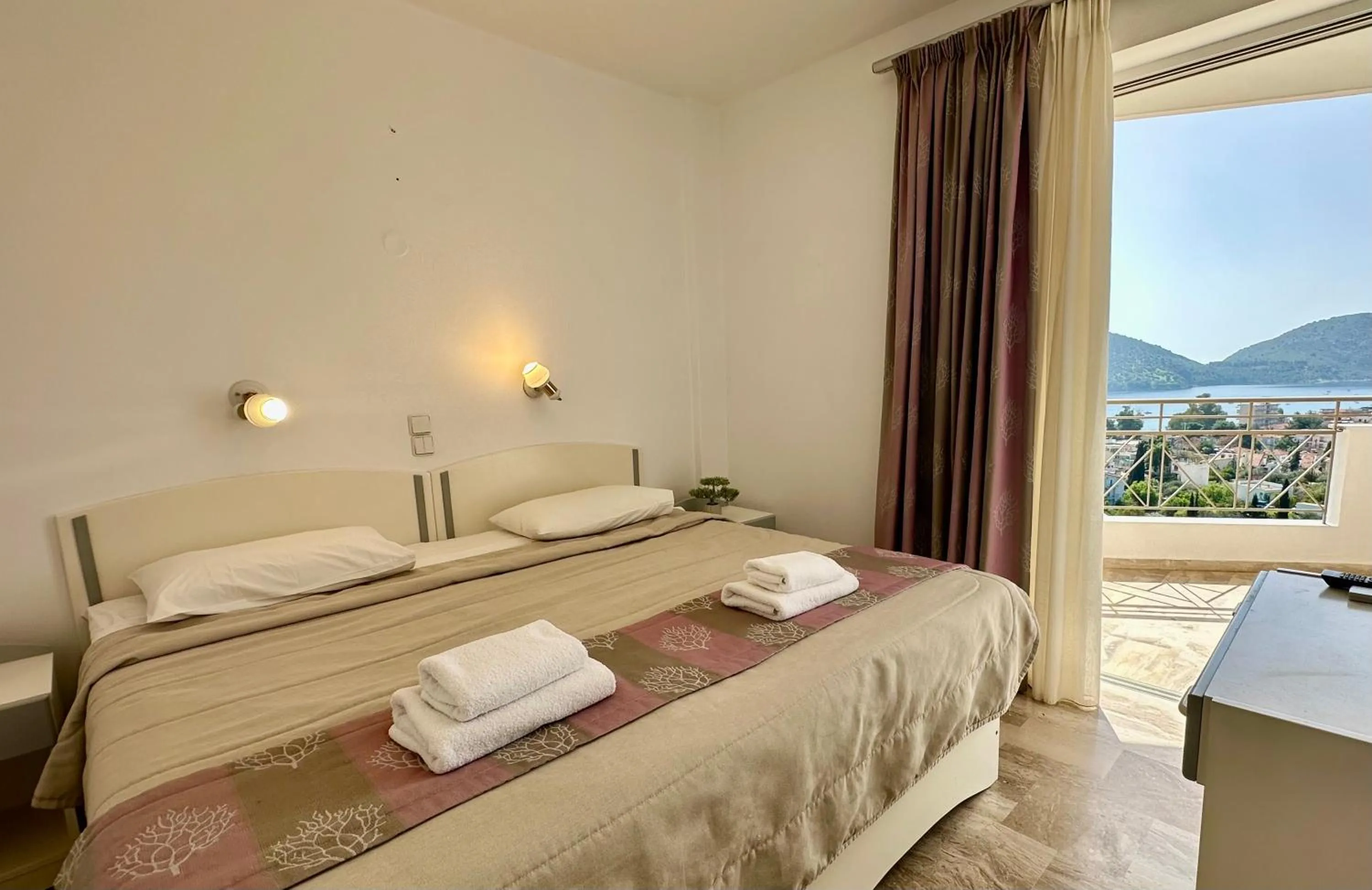 Bed in Hotel Apartments Panorama