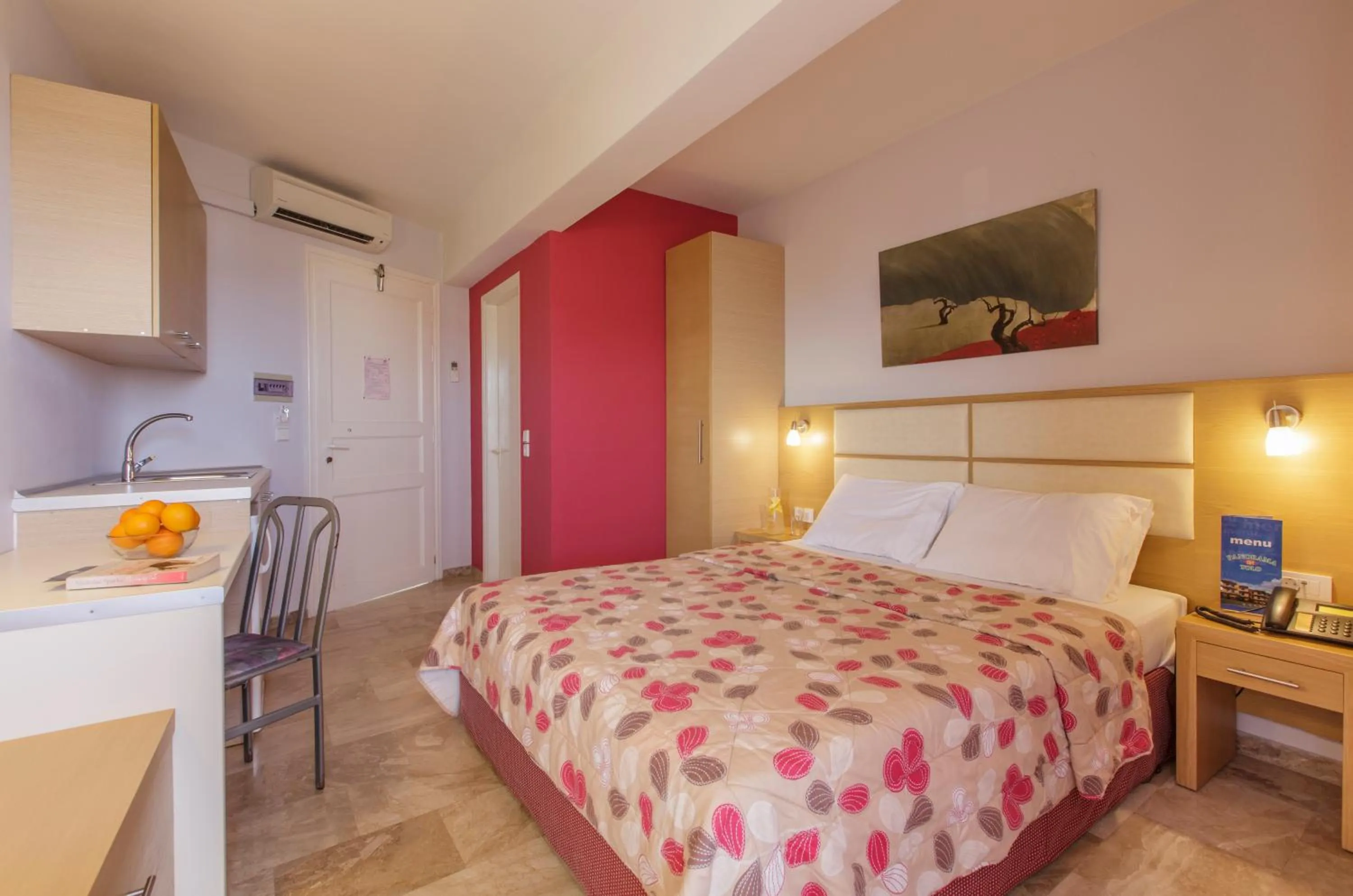 Bed in Hotel Apartments Panorama