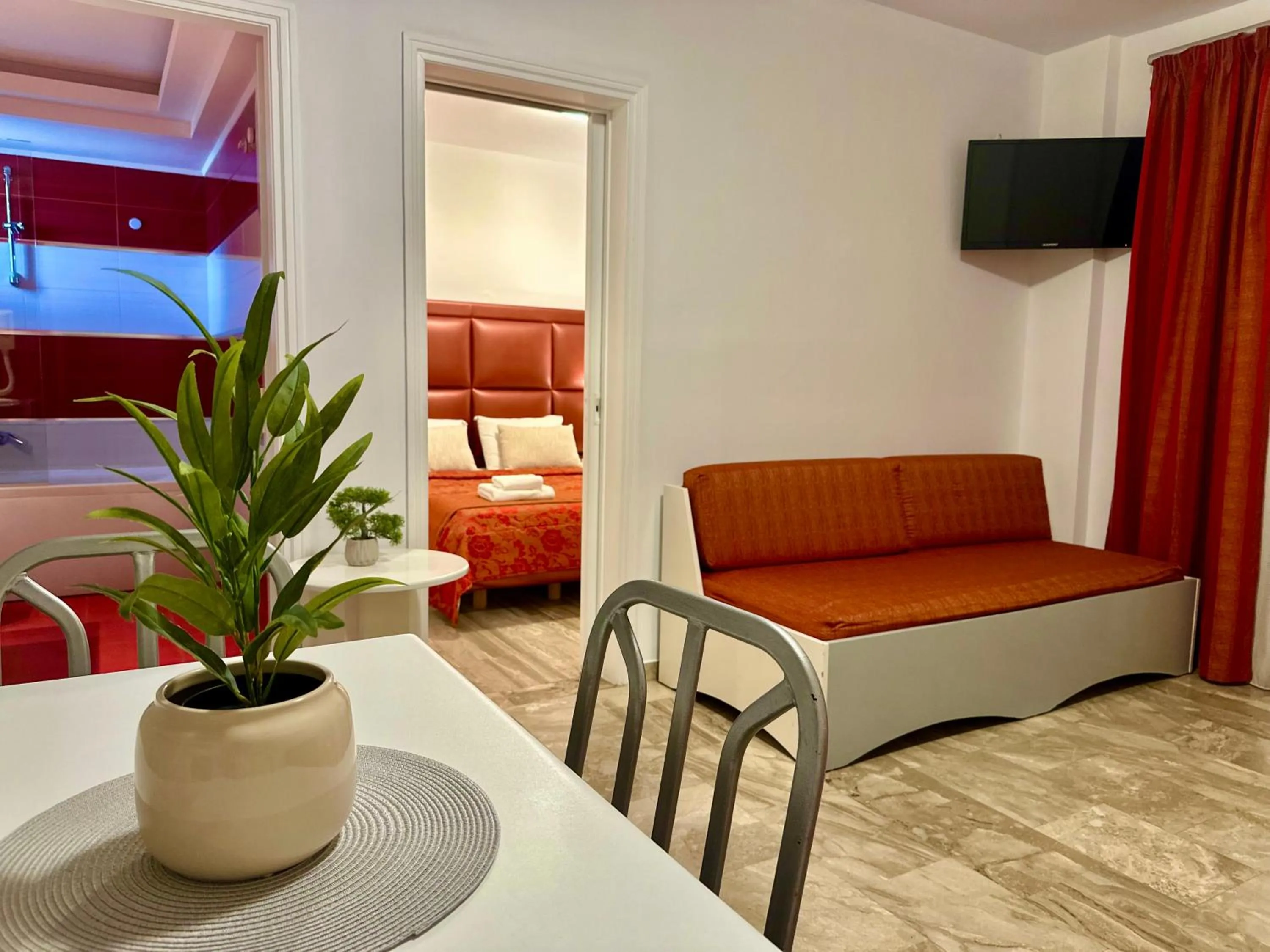 Bed in Hotel Apartments Panorama