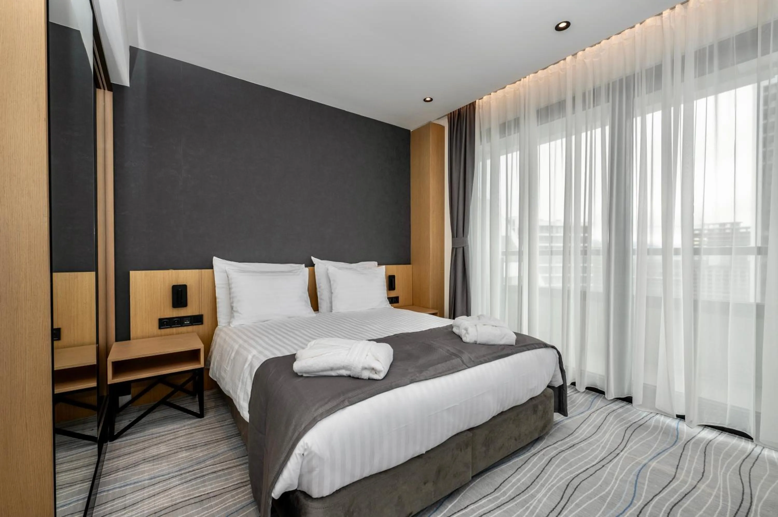 Bed in The Grandeur Hotel