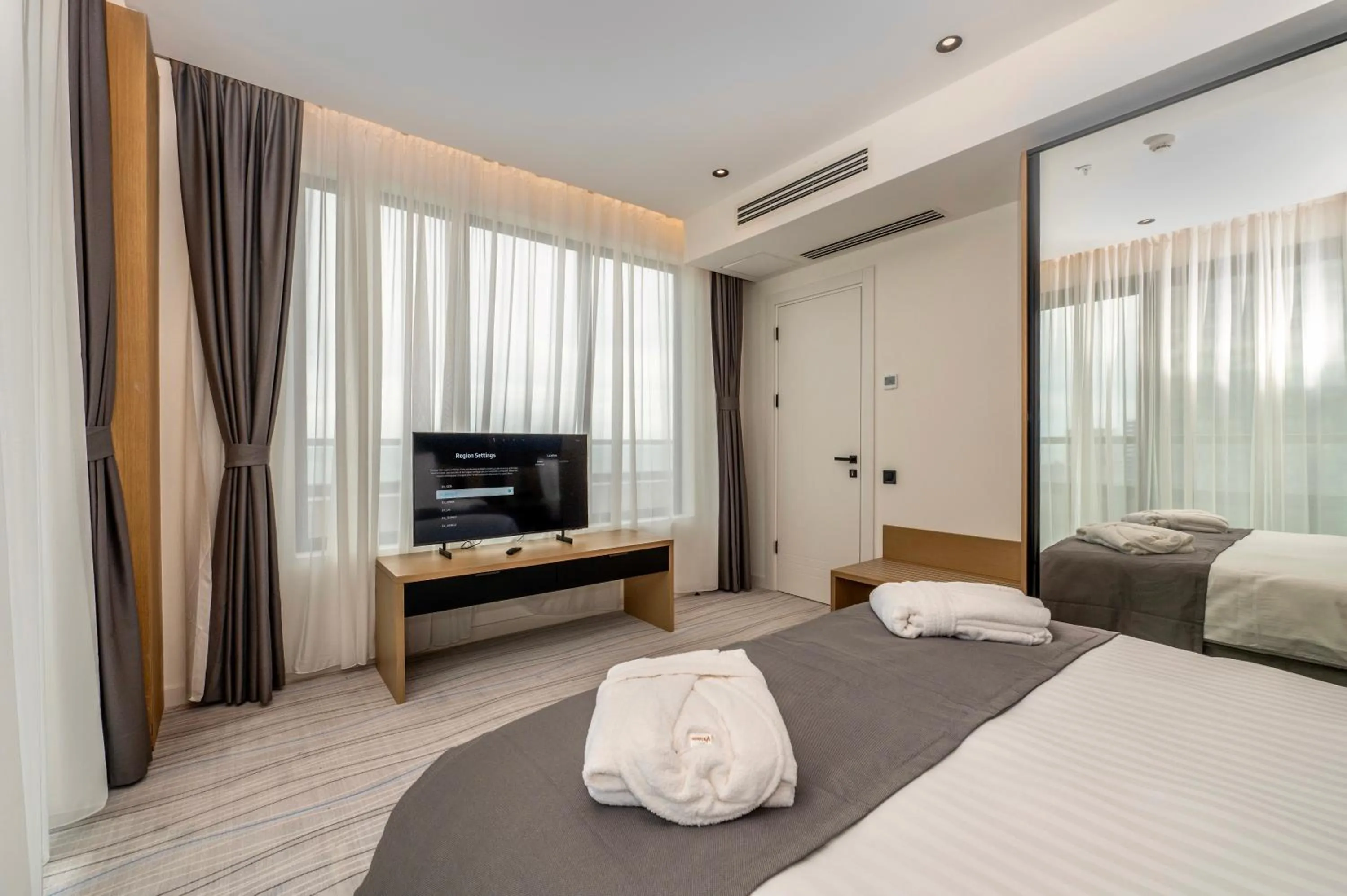 TV and multimedia, Bed in The Grandeur Hotel