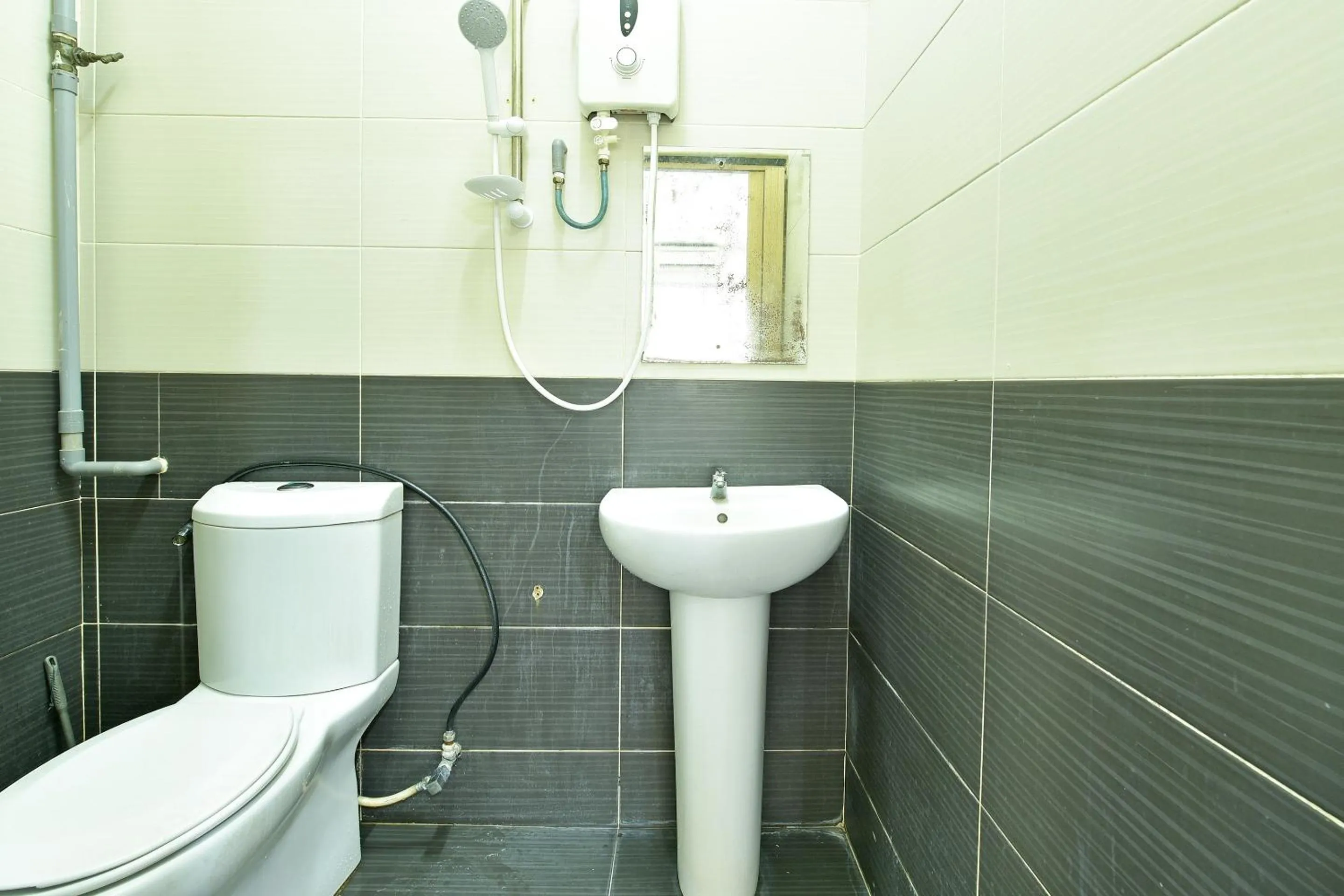 Bathroom in Hotel O Mini Indah