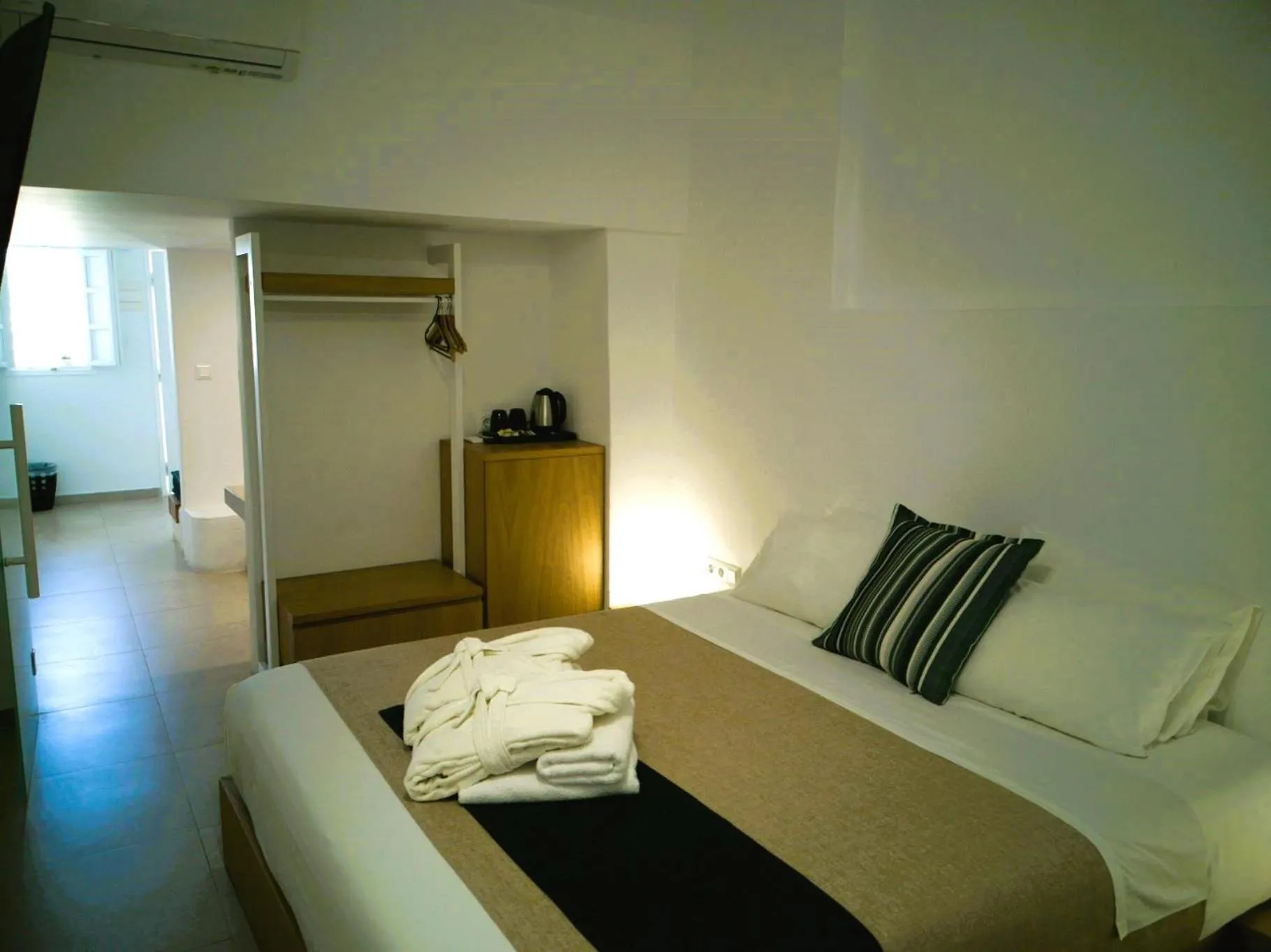 Bed in Muses Cycladic Suites