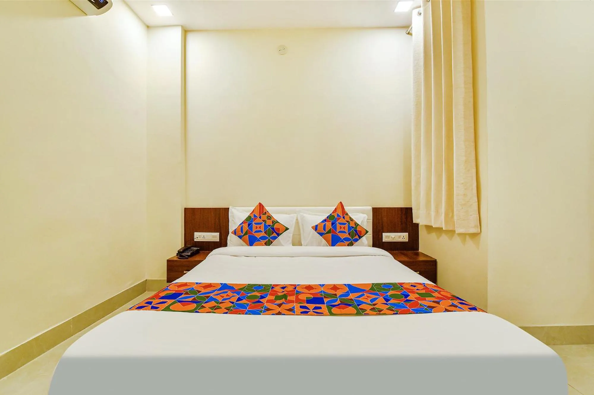 Bed in FabHotel Diamond I