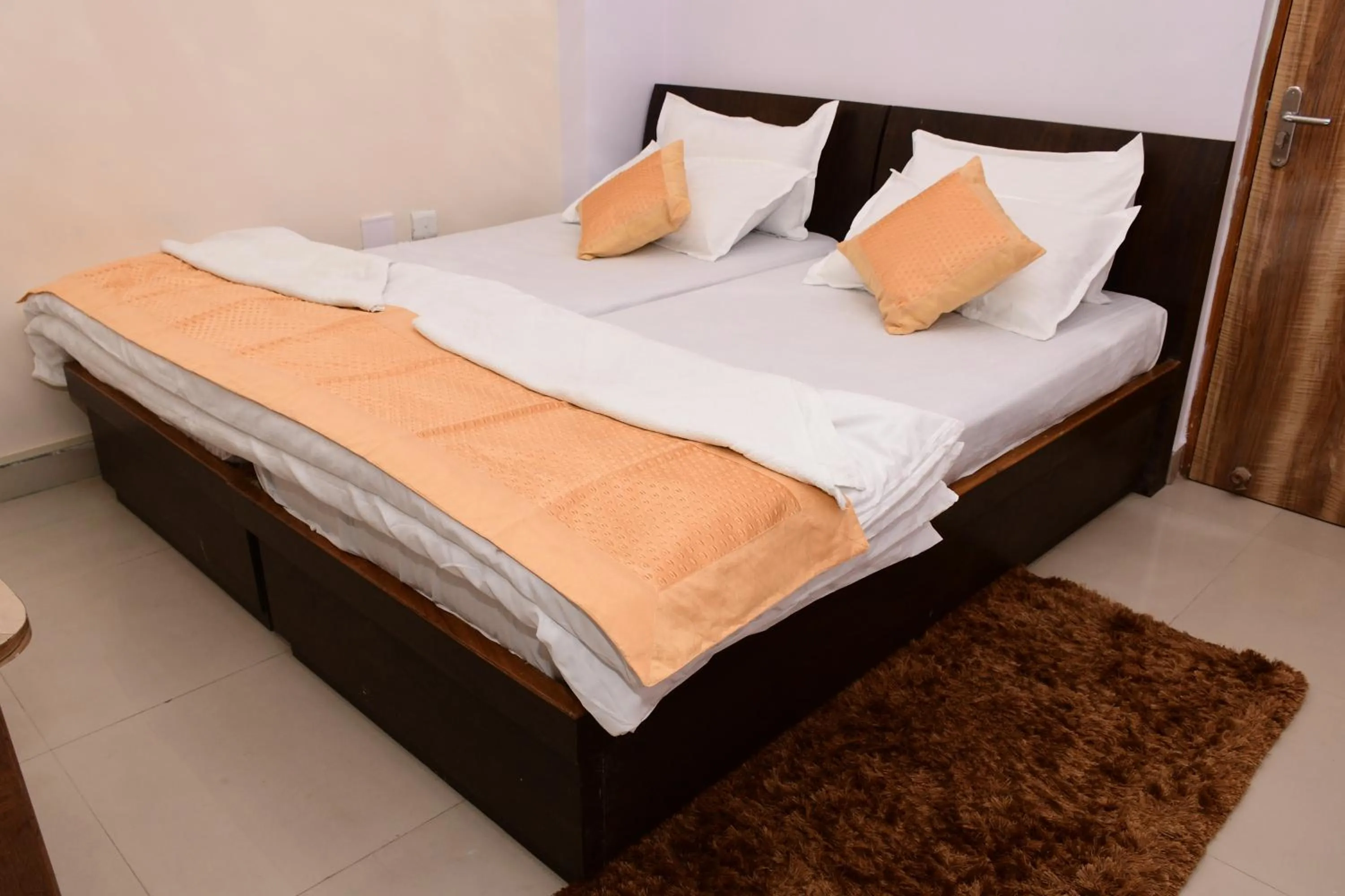 Bed in Hotel Buddha International