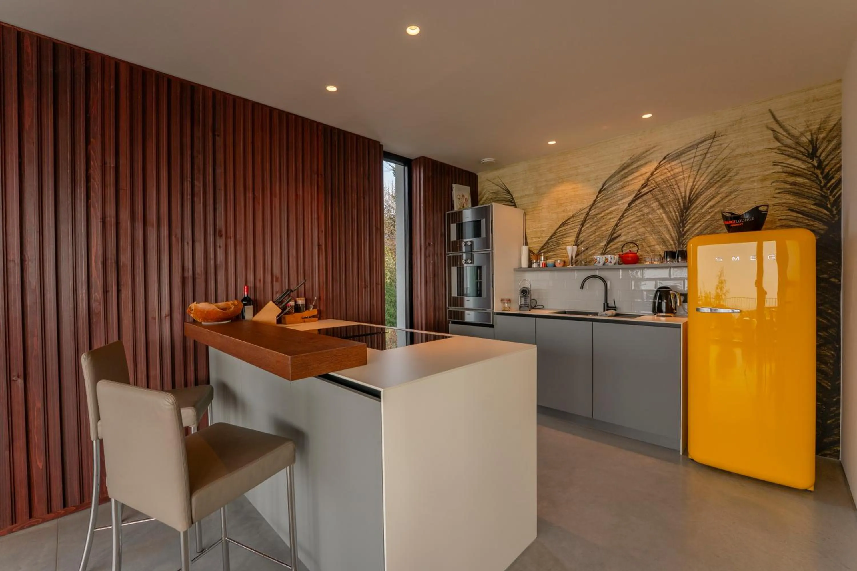 Kitchen or kitchenette in ORANGE LOUNGE Attersee