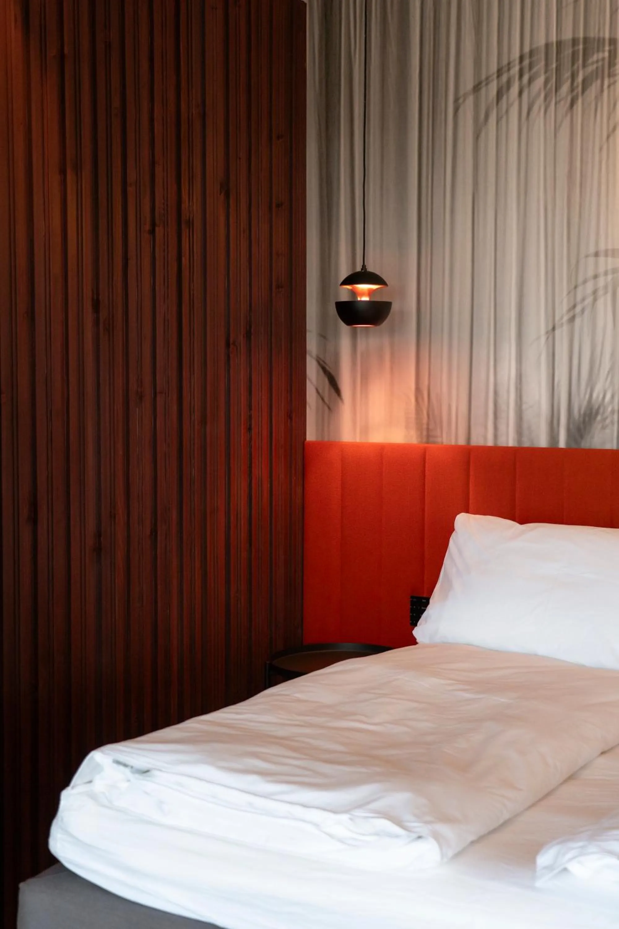 Bed in ORANGE LOUNGE Attersee