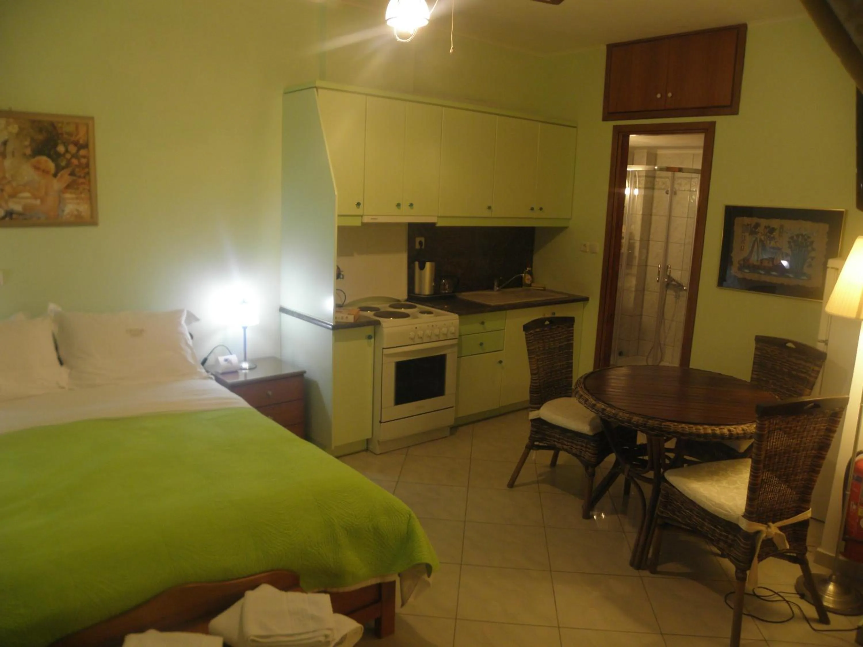 Bed in Irida Beach Resort Suites