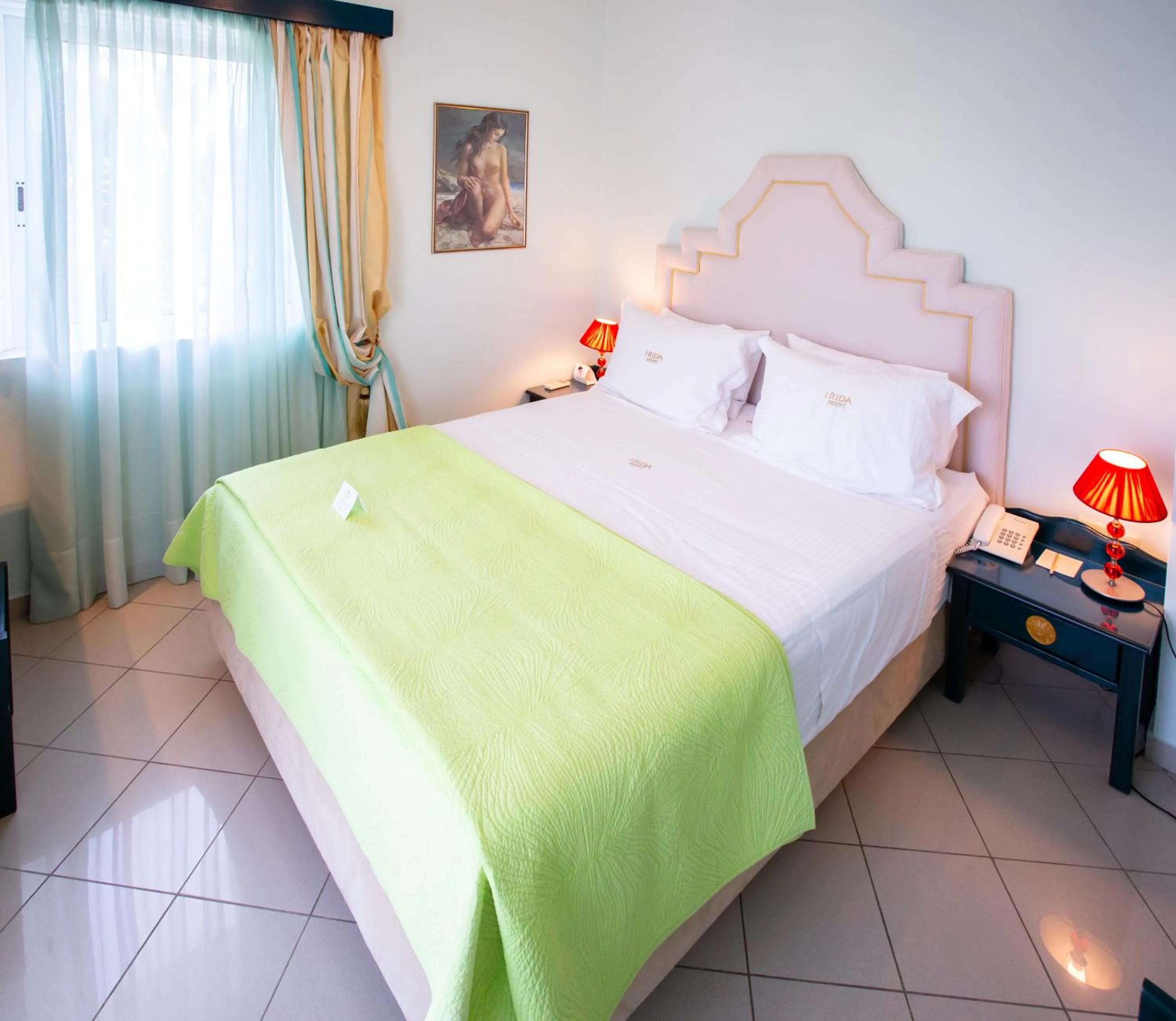 Photo of the whole room, Bed in Irida Beach Resort Suites