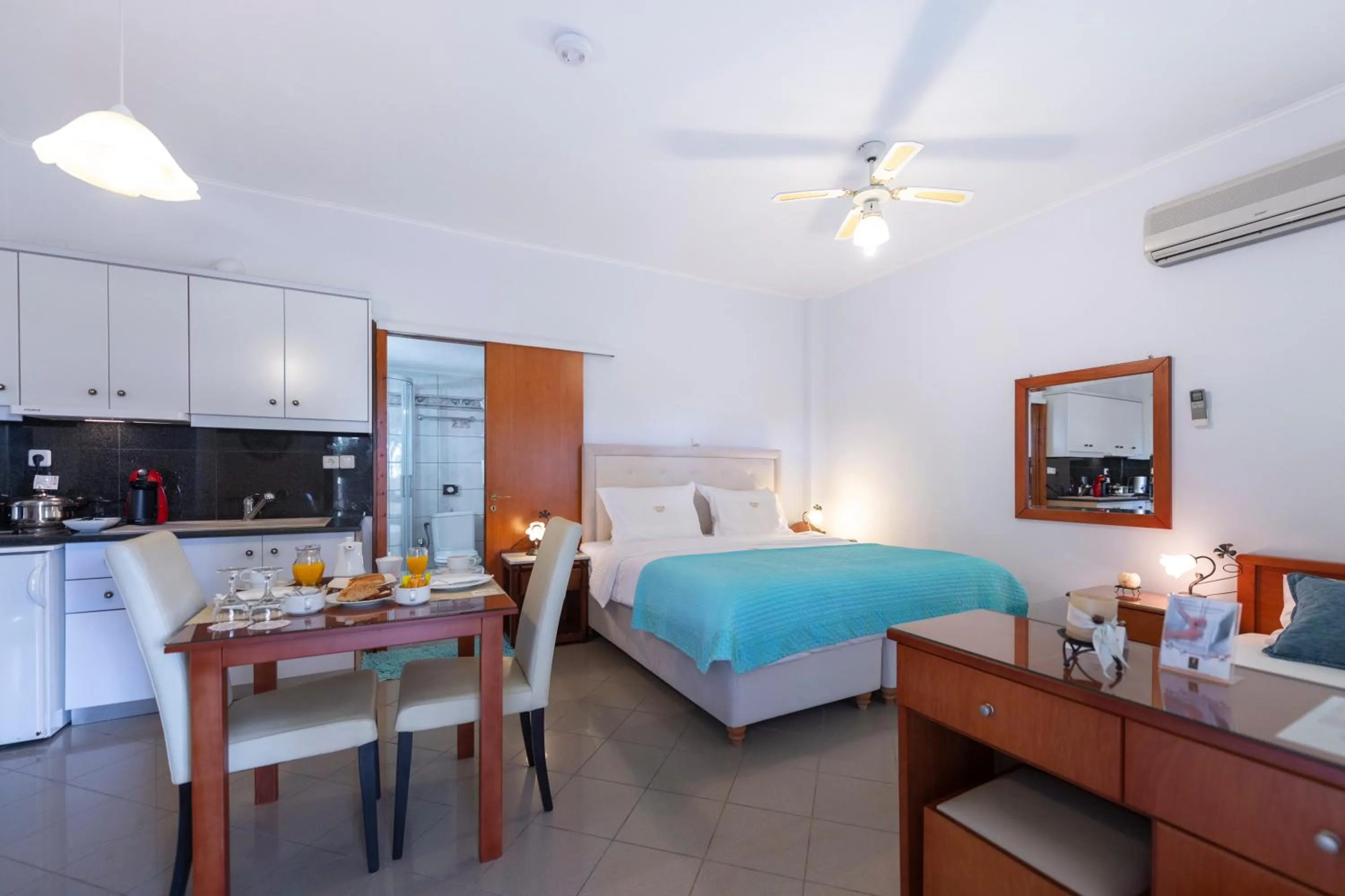 Property building, Bed in Irida Beach Resort Suites