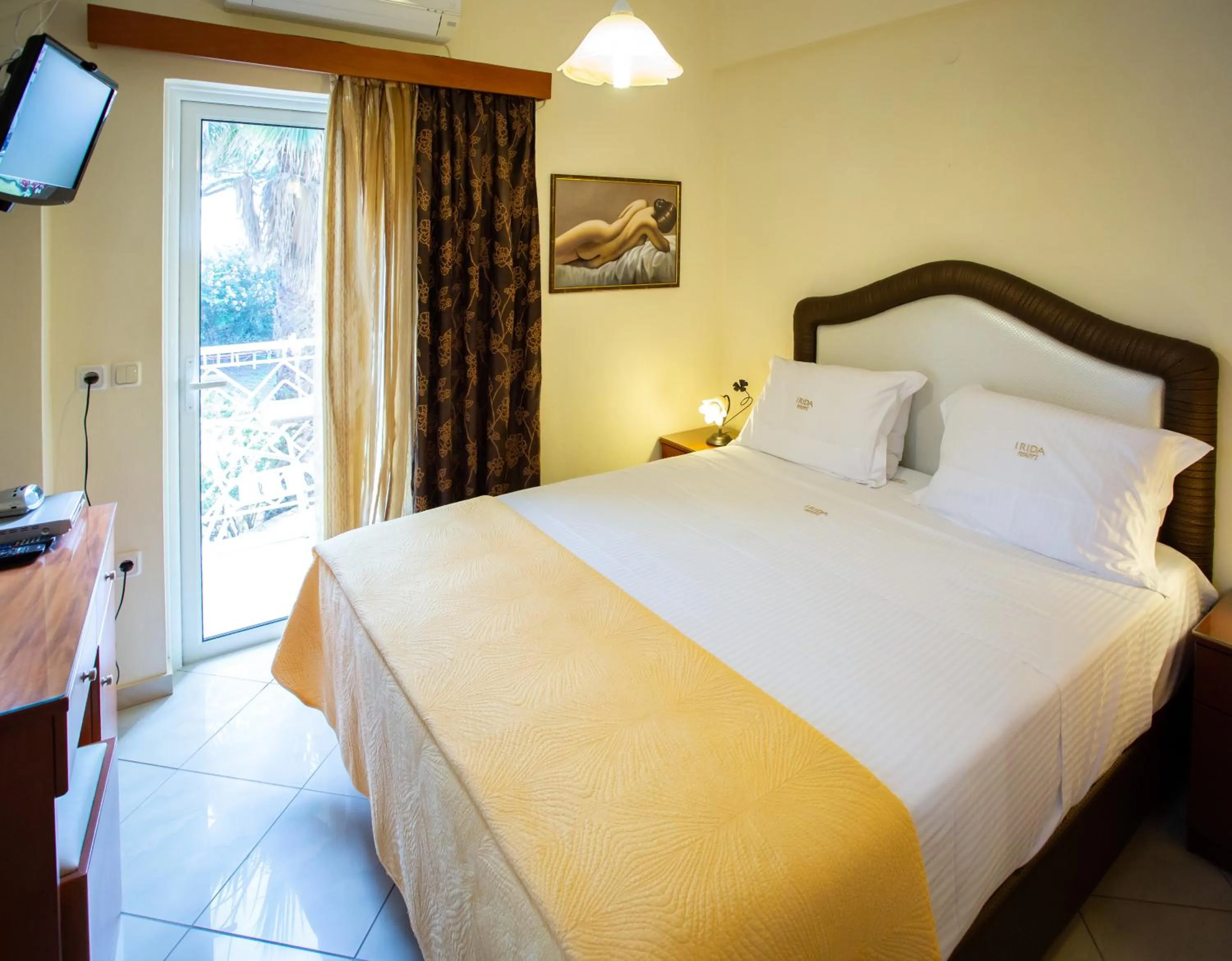 Spring, Bed in Irida Beach Resort Suites