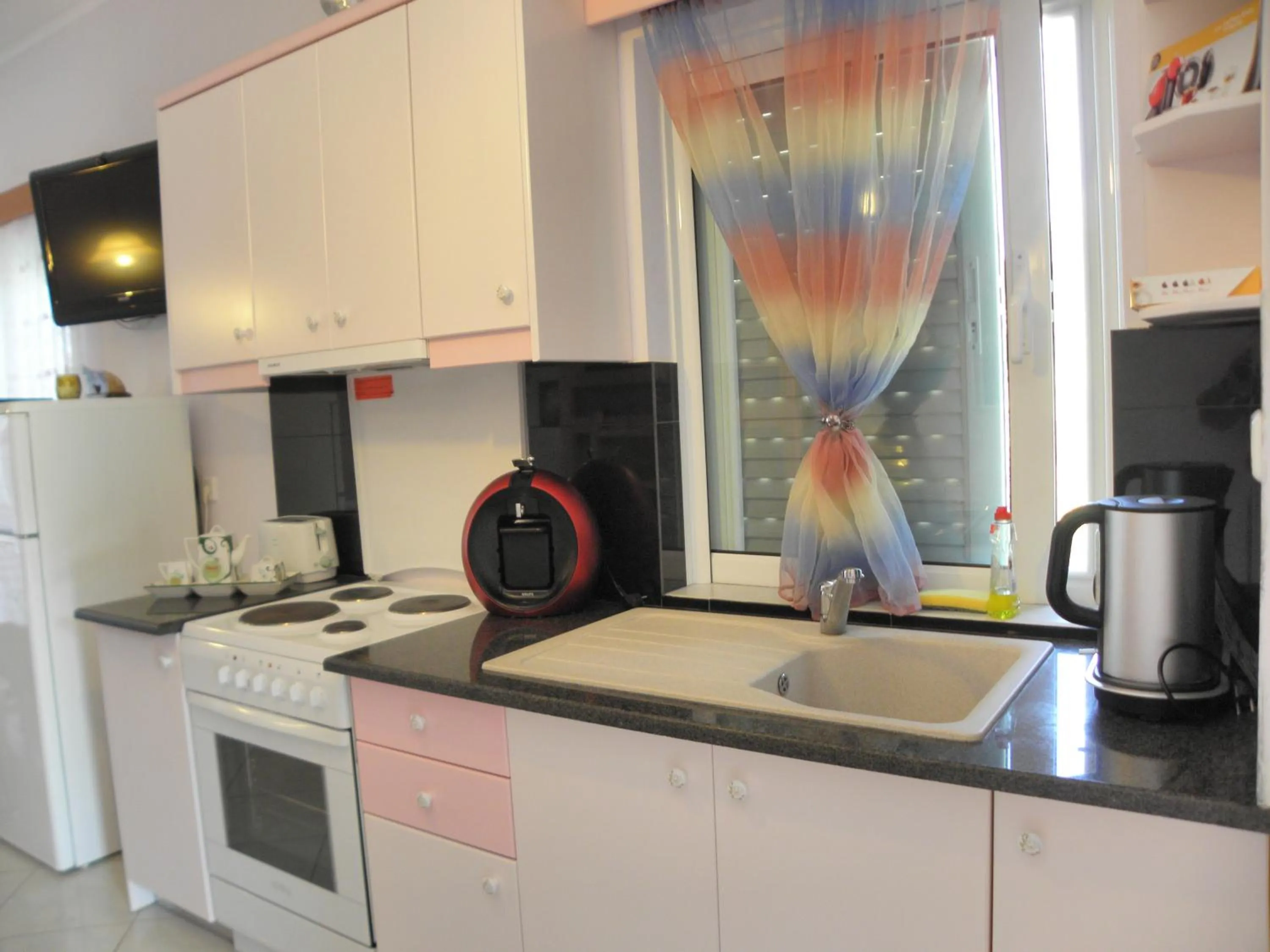 Kitchen or kitchenette in Irida Beach Resort Suites