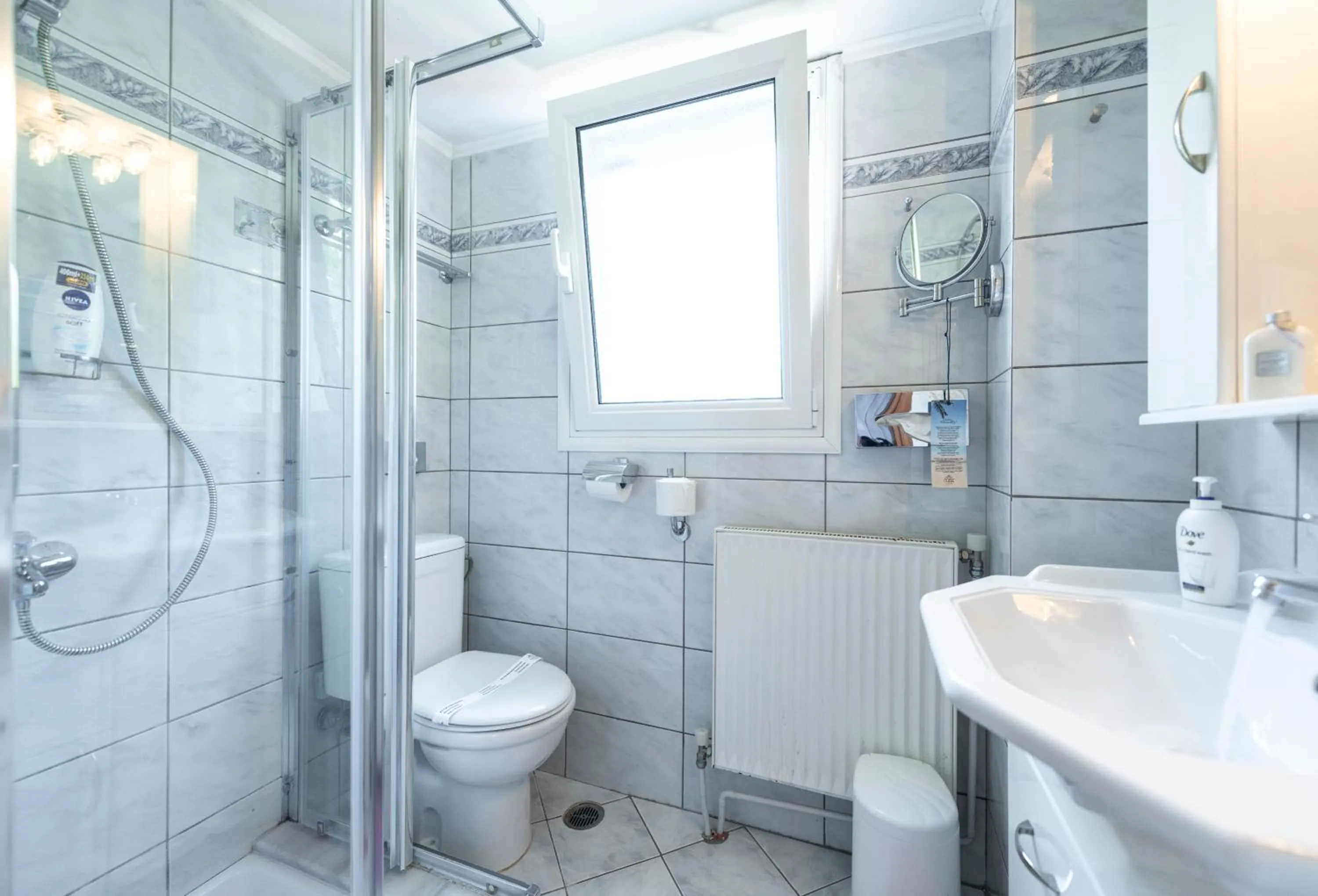 Bathroom in Irida Beach Resort Suites