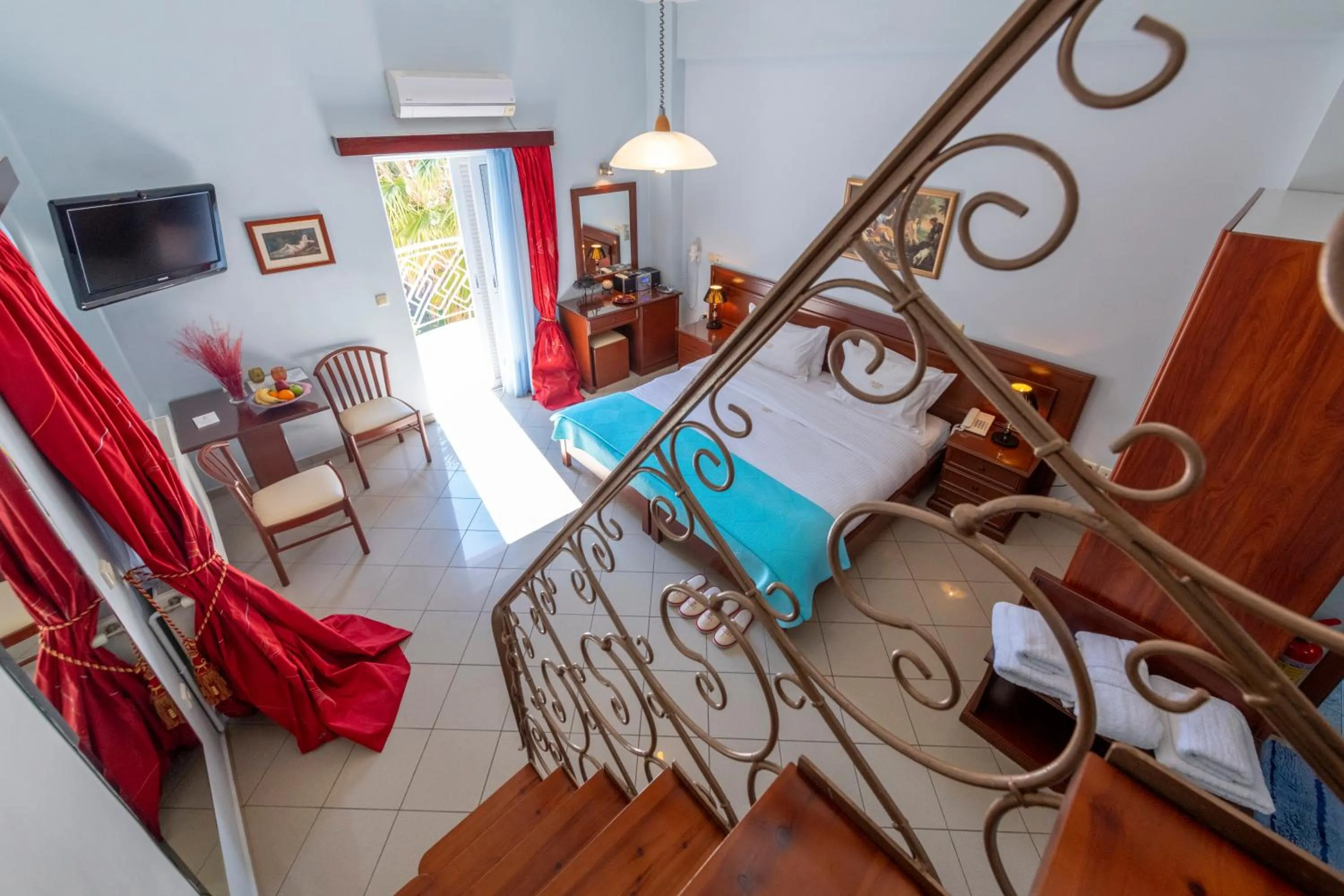 Bed in Irida Beach Resort Suites