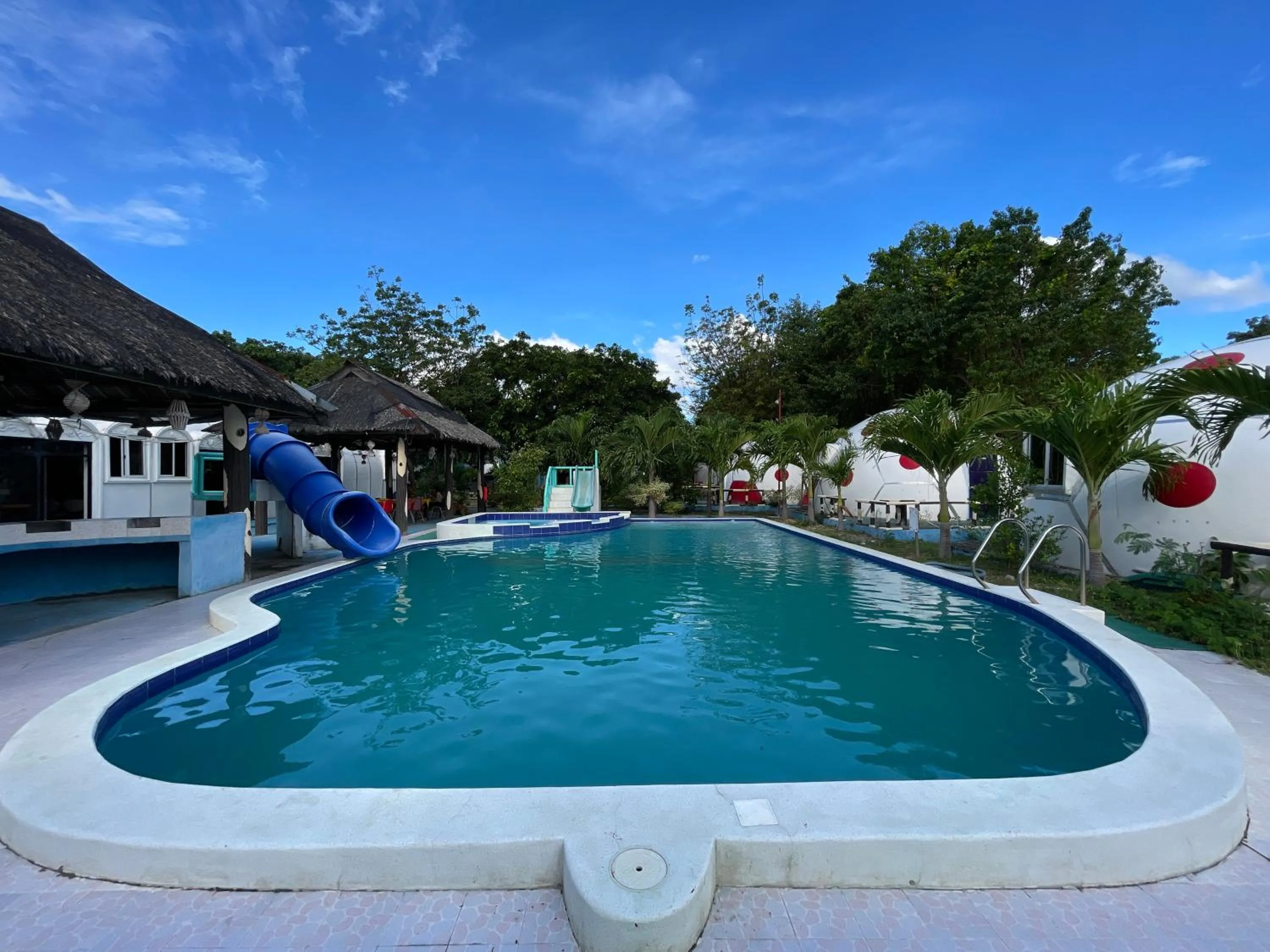 Swimming pool in Binubusan Beach Hotel and Resort