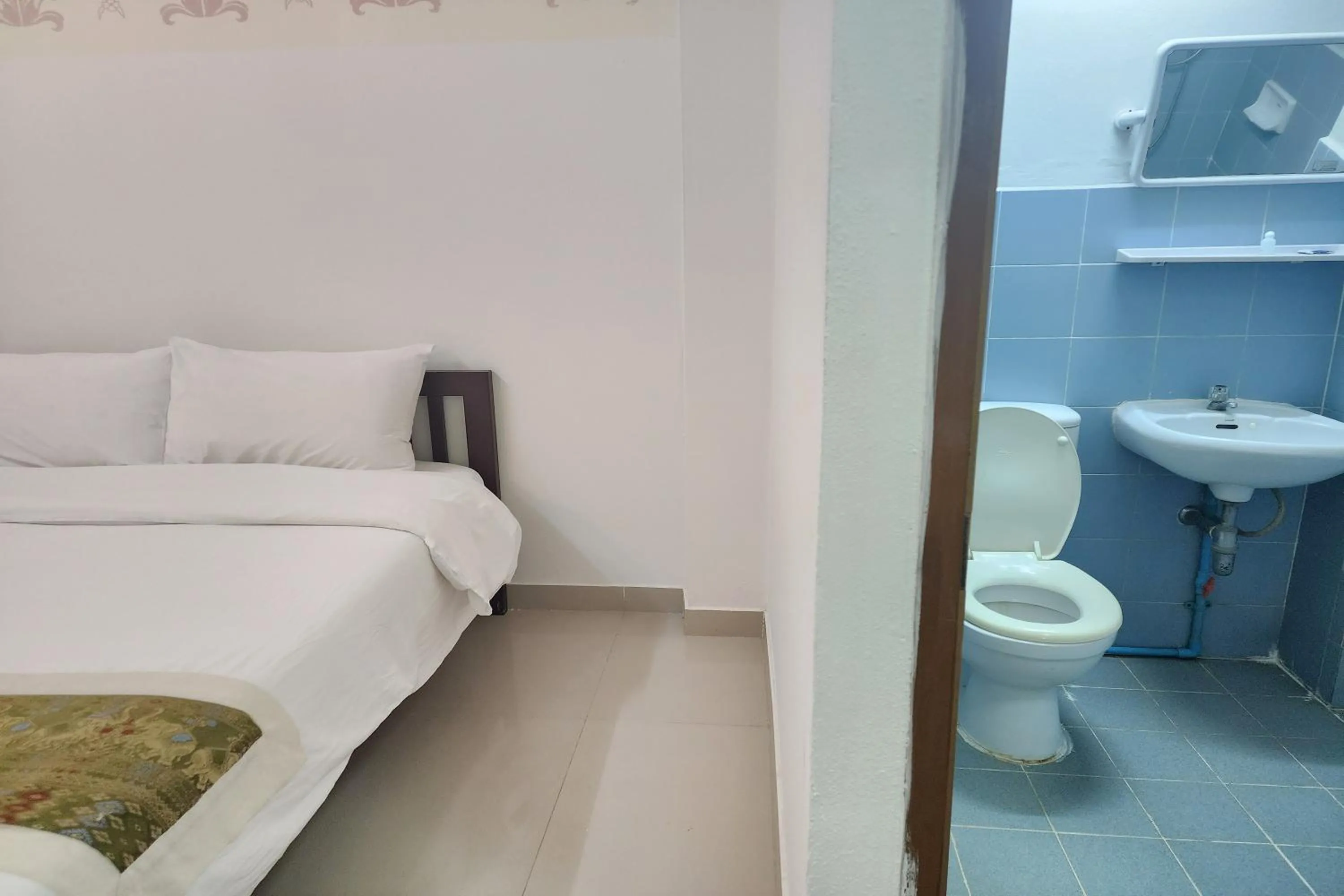 Bathroom, Bed in Green Apartment Kaset