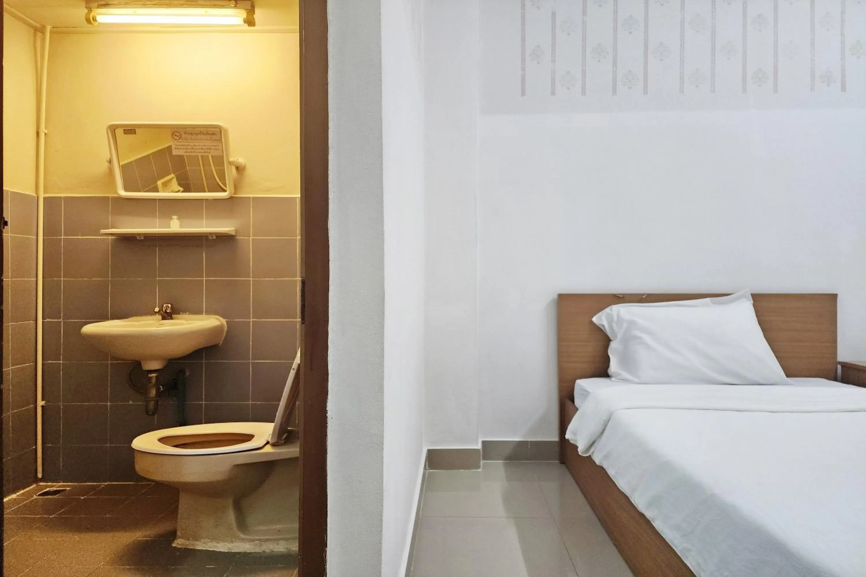 Bed in Green Apartment Kaset