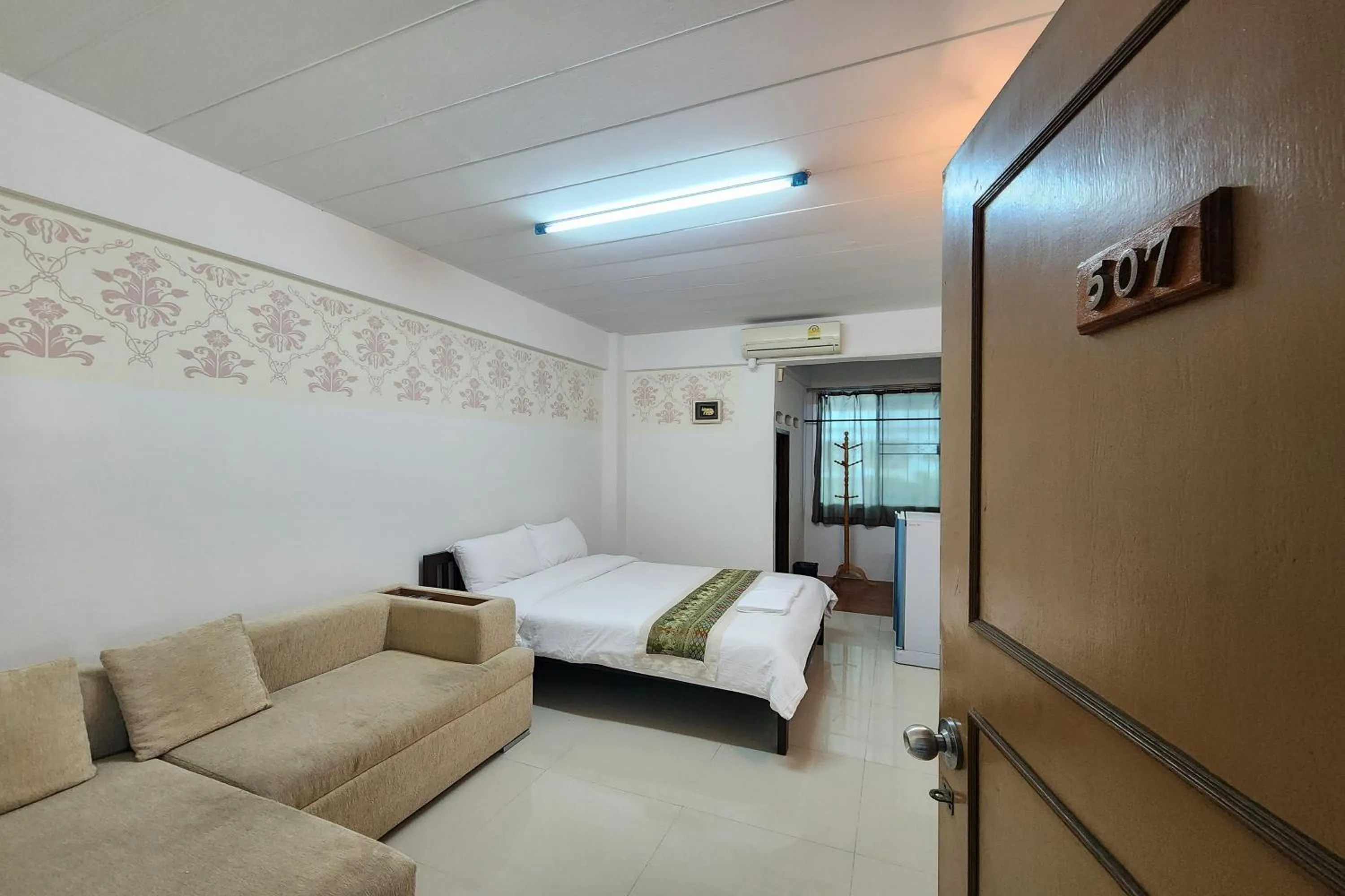 Bed in Green Apartment Kaset