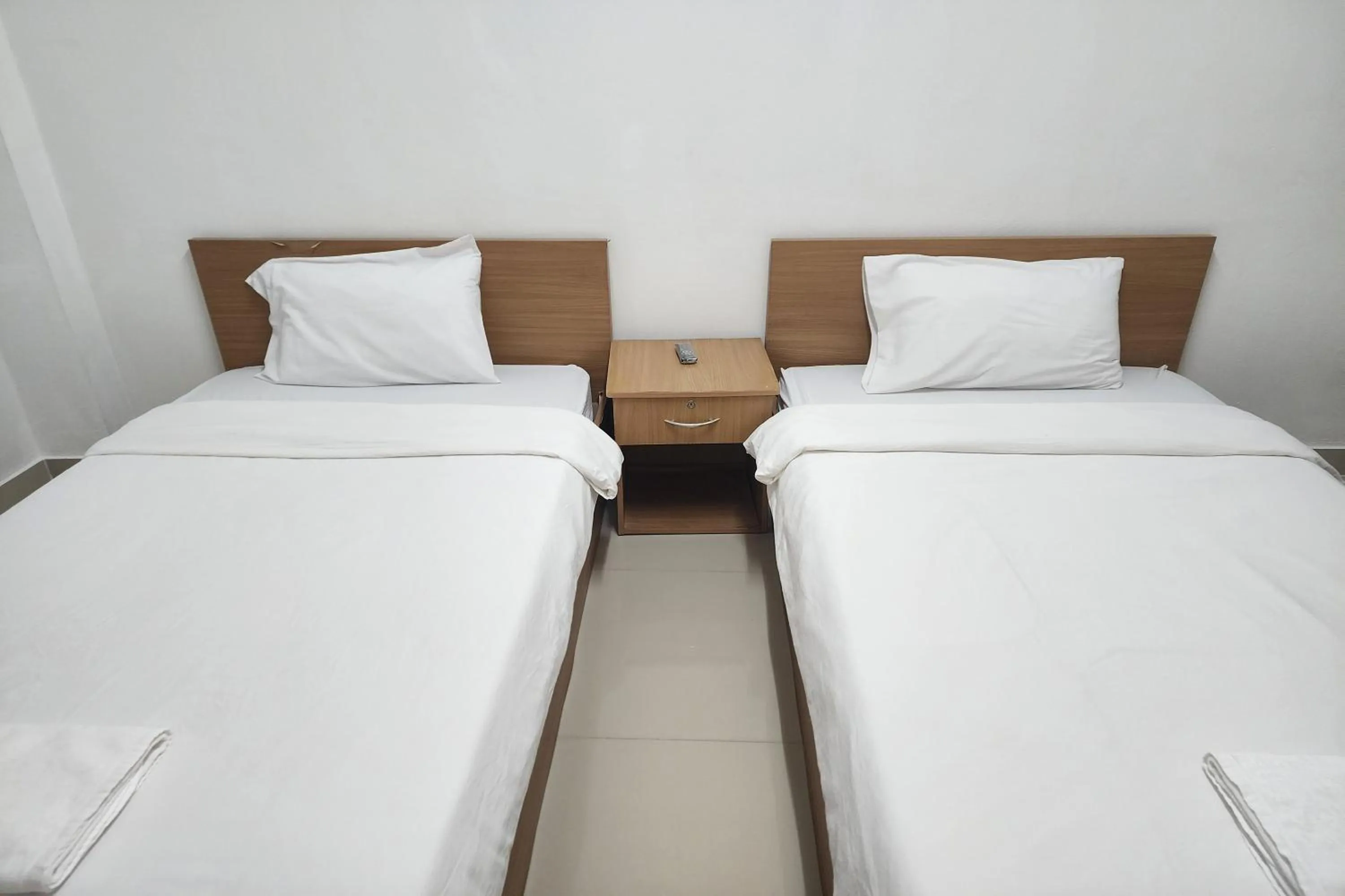 Bed in Green Apartment Kaset