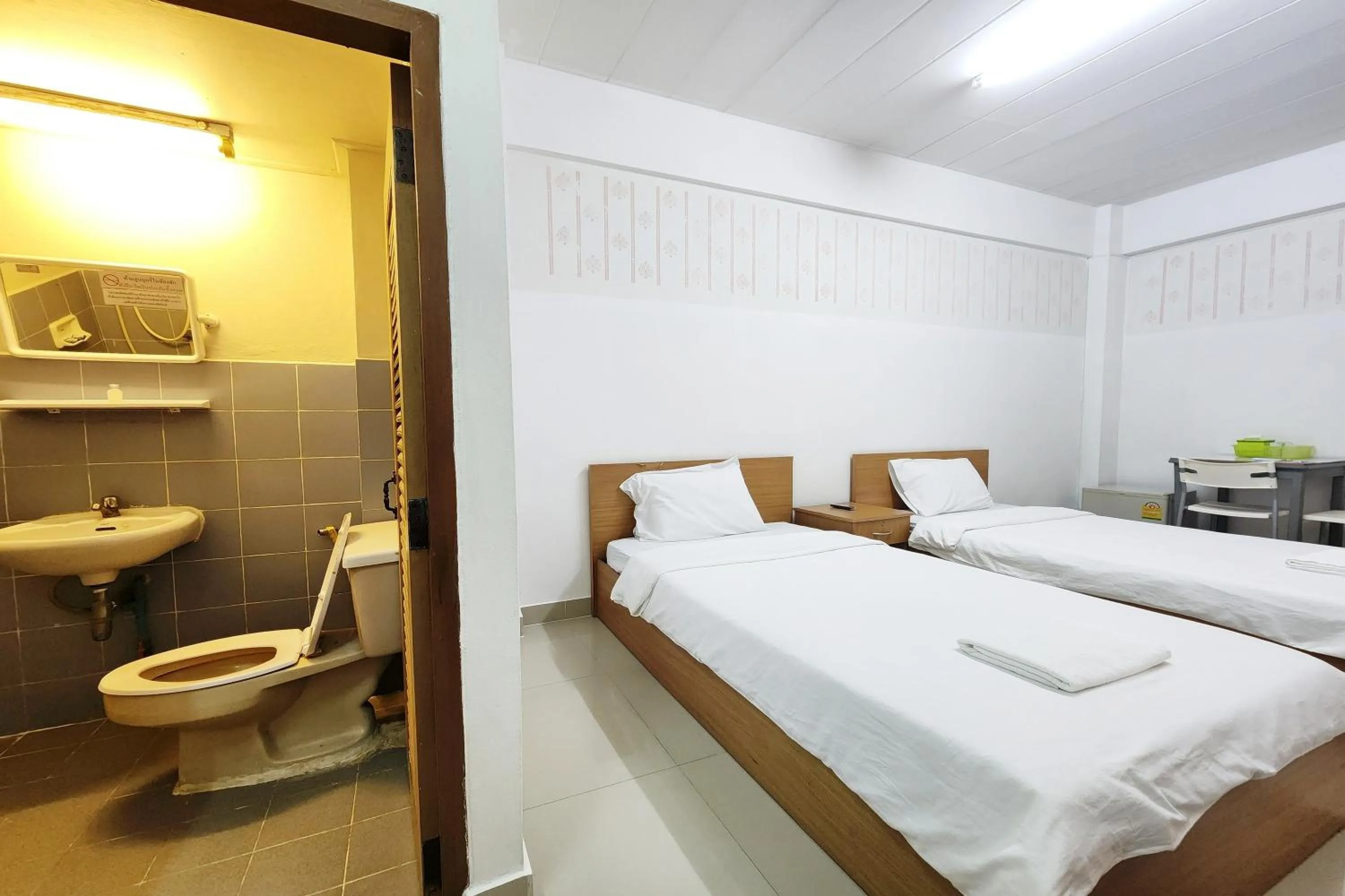 Toilet, Bed in Green Apartment Kaset