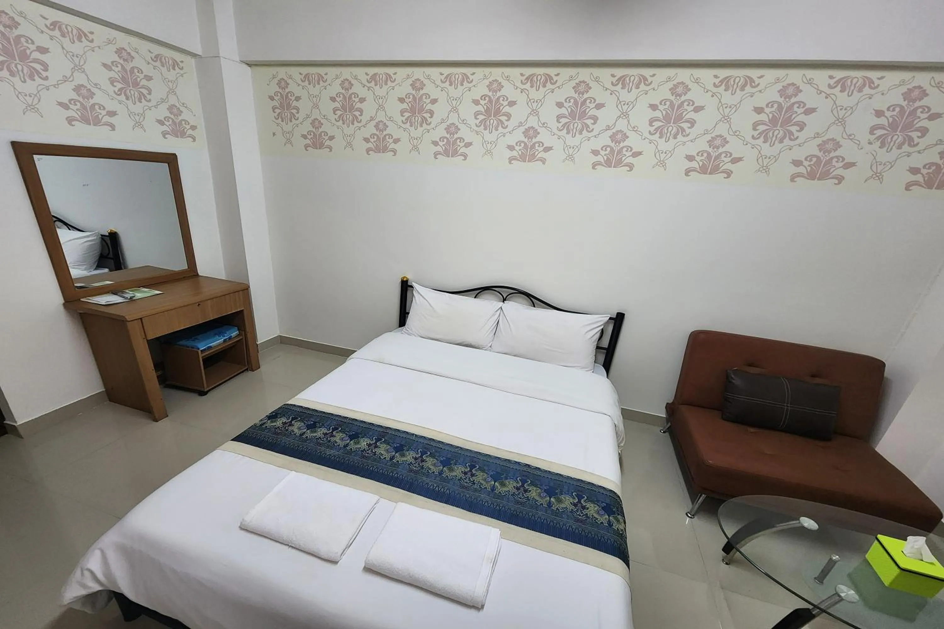 Bed in Green Apartment Kaset