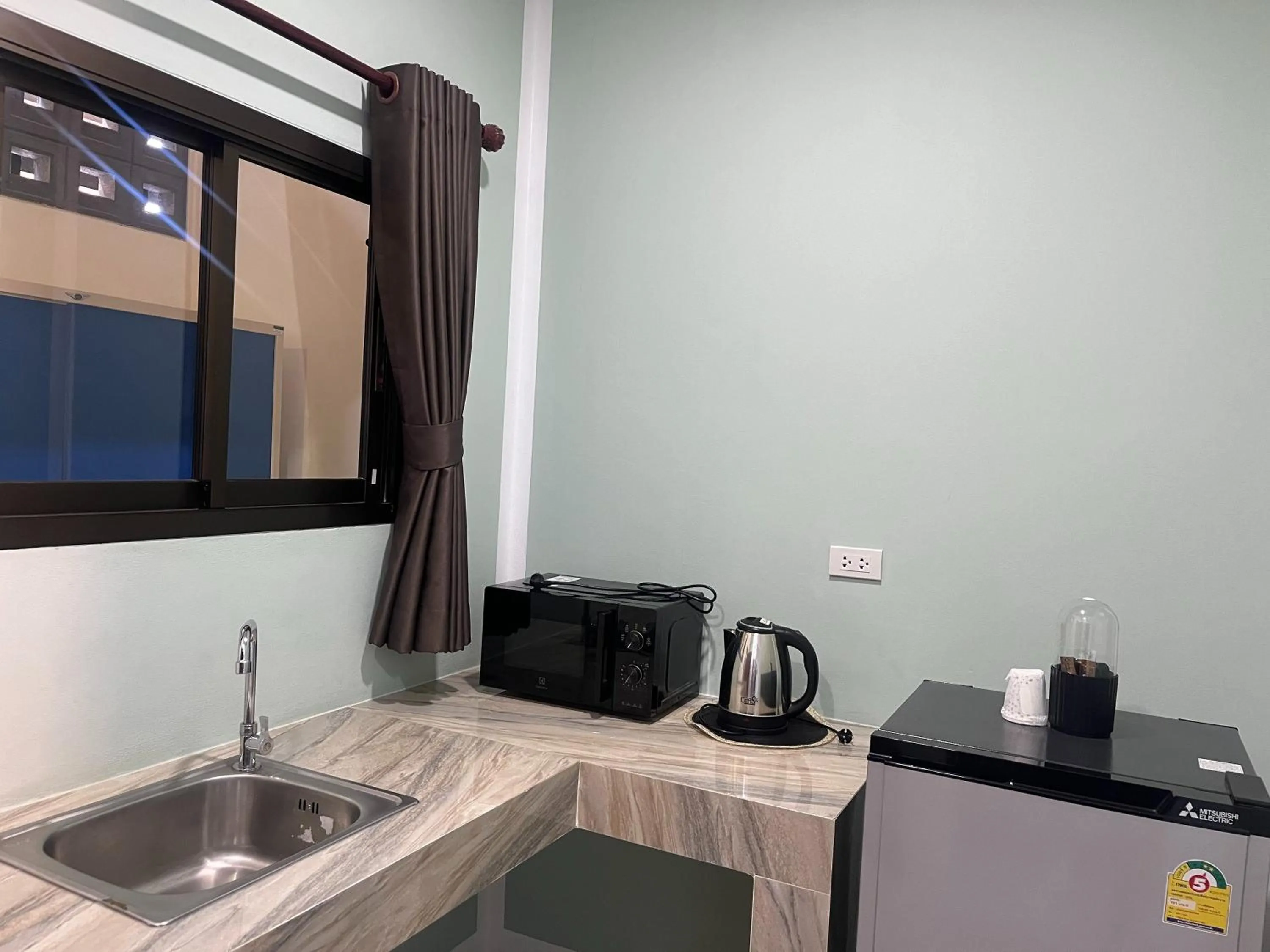 kitchen in J & Ariya Hotel Near Samui Airport and Koh Phangan Pier