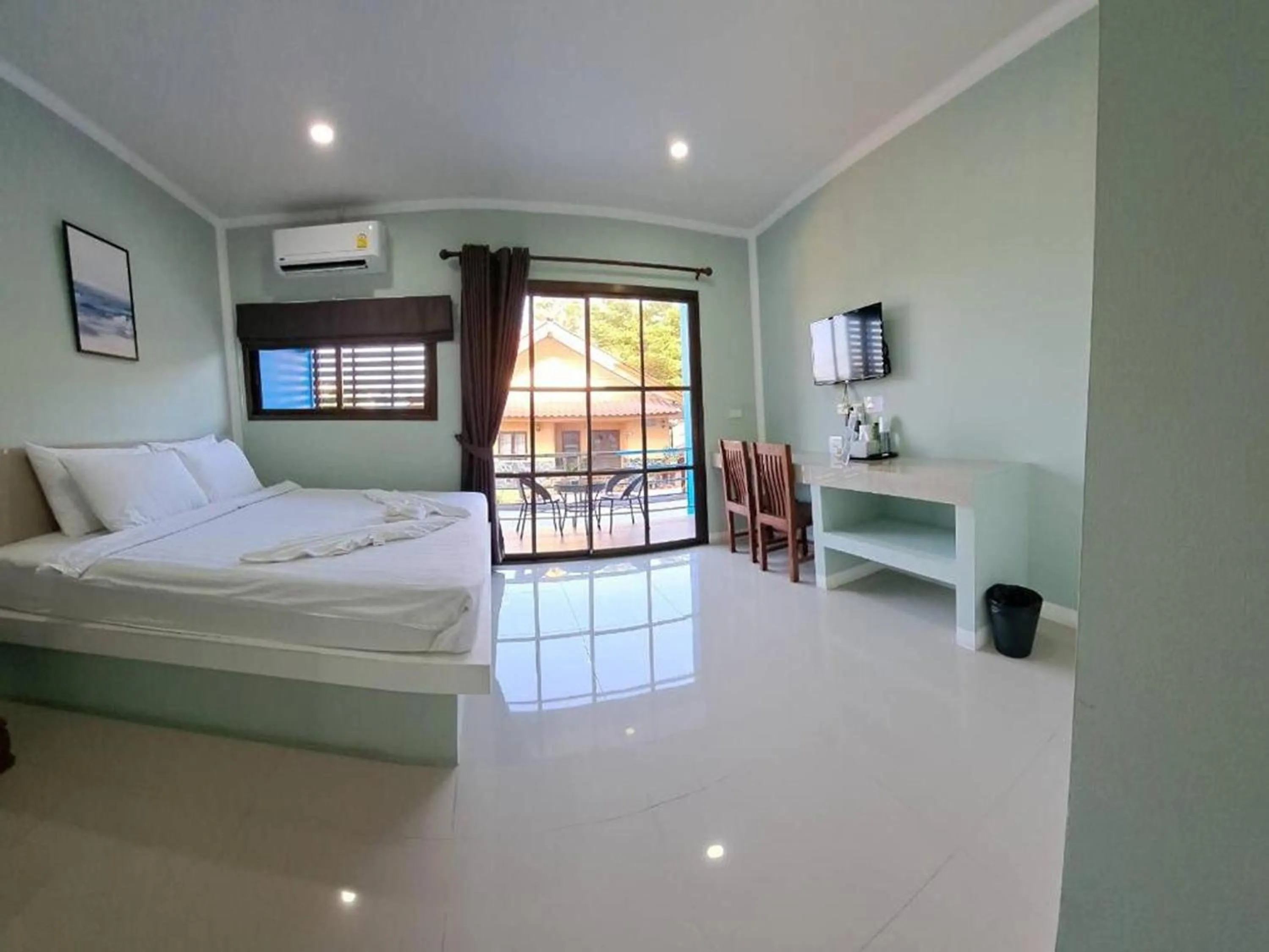 Photo of the whole room, Bed in J & Ariya Hotel Near Samui Airport and Koh Phangan Pier
